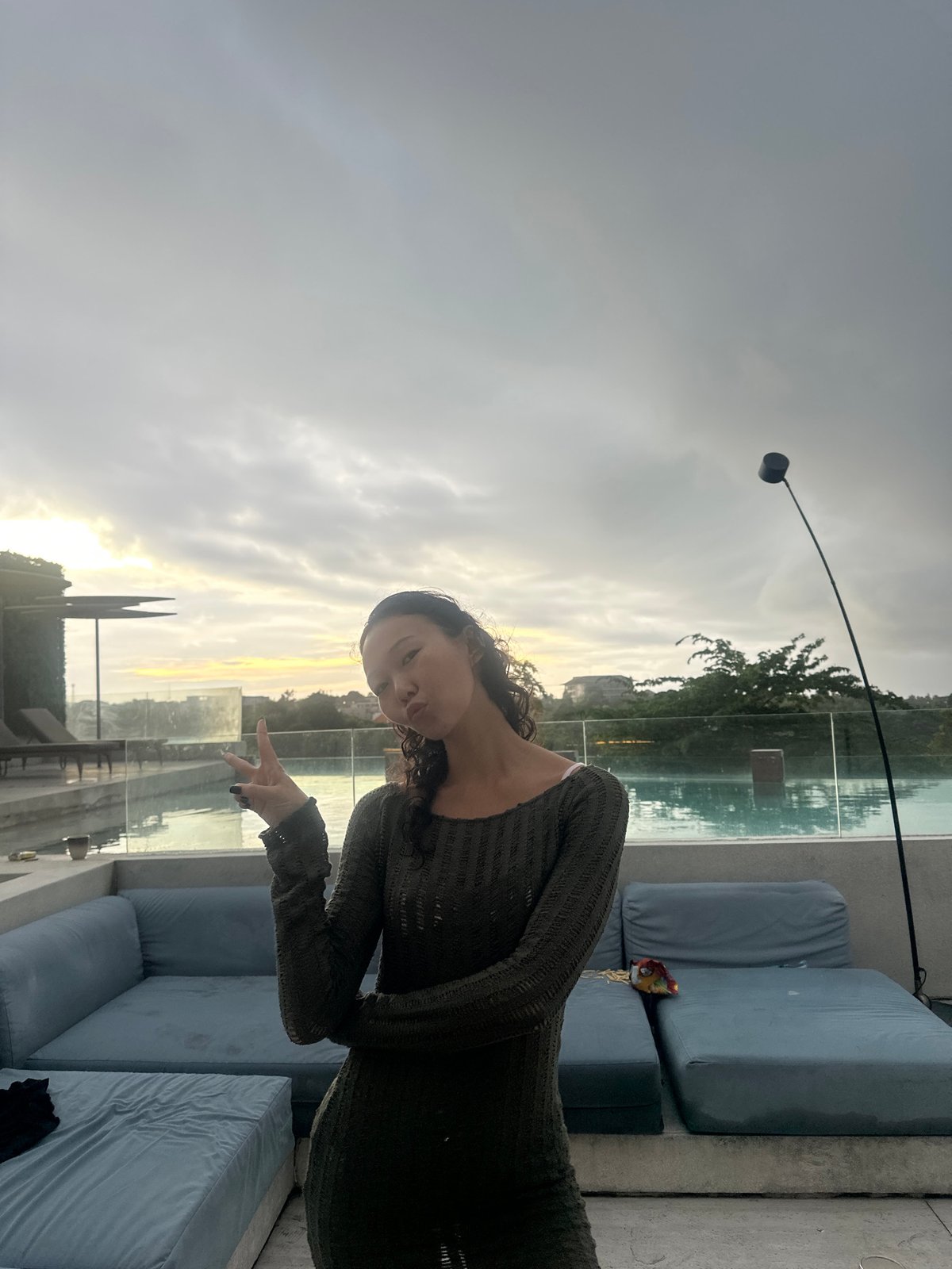 Woman photographed on rooftop terrace in Kuta Selatan, Indonesia