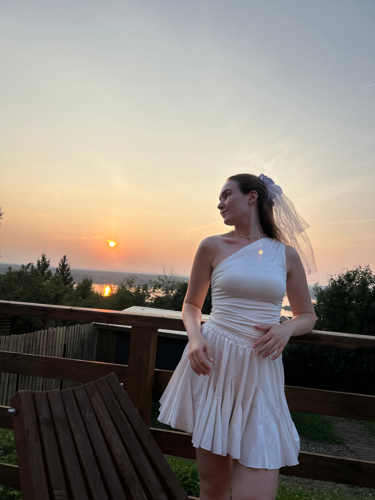 Sunset evening on a riverside deck in Chaikovsky, Russia