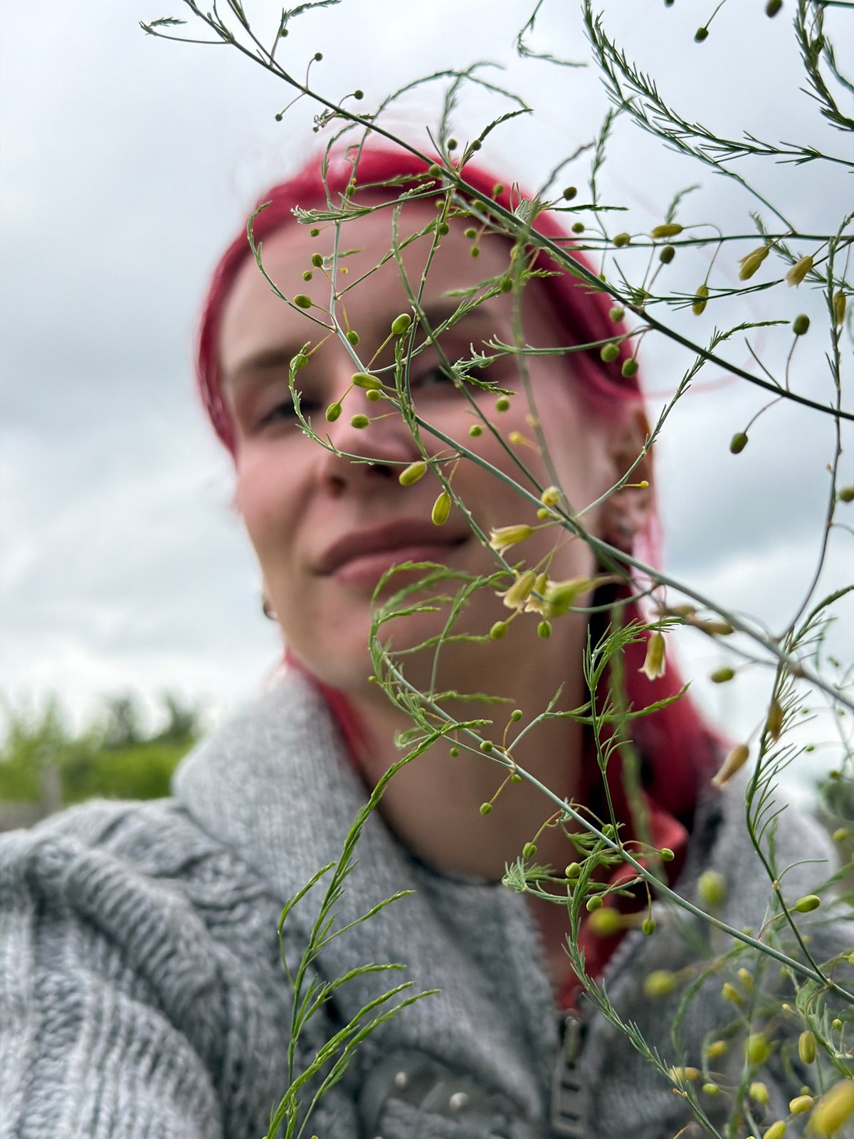 Red-haired person photographed in casual portrait session, Chaikovsky Russia