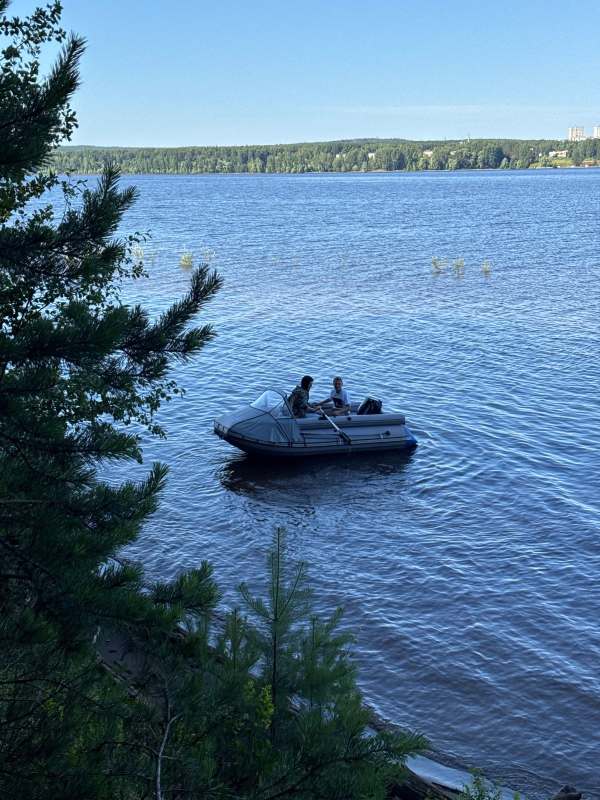 Forest camping and river boating near Chaikovsky on a summer day