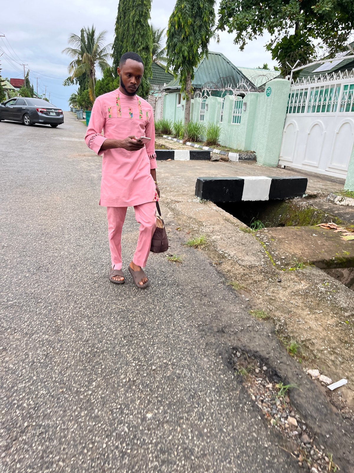 Morning street life documented across residential Abuja neighborhoods