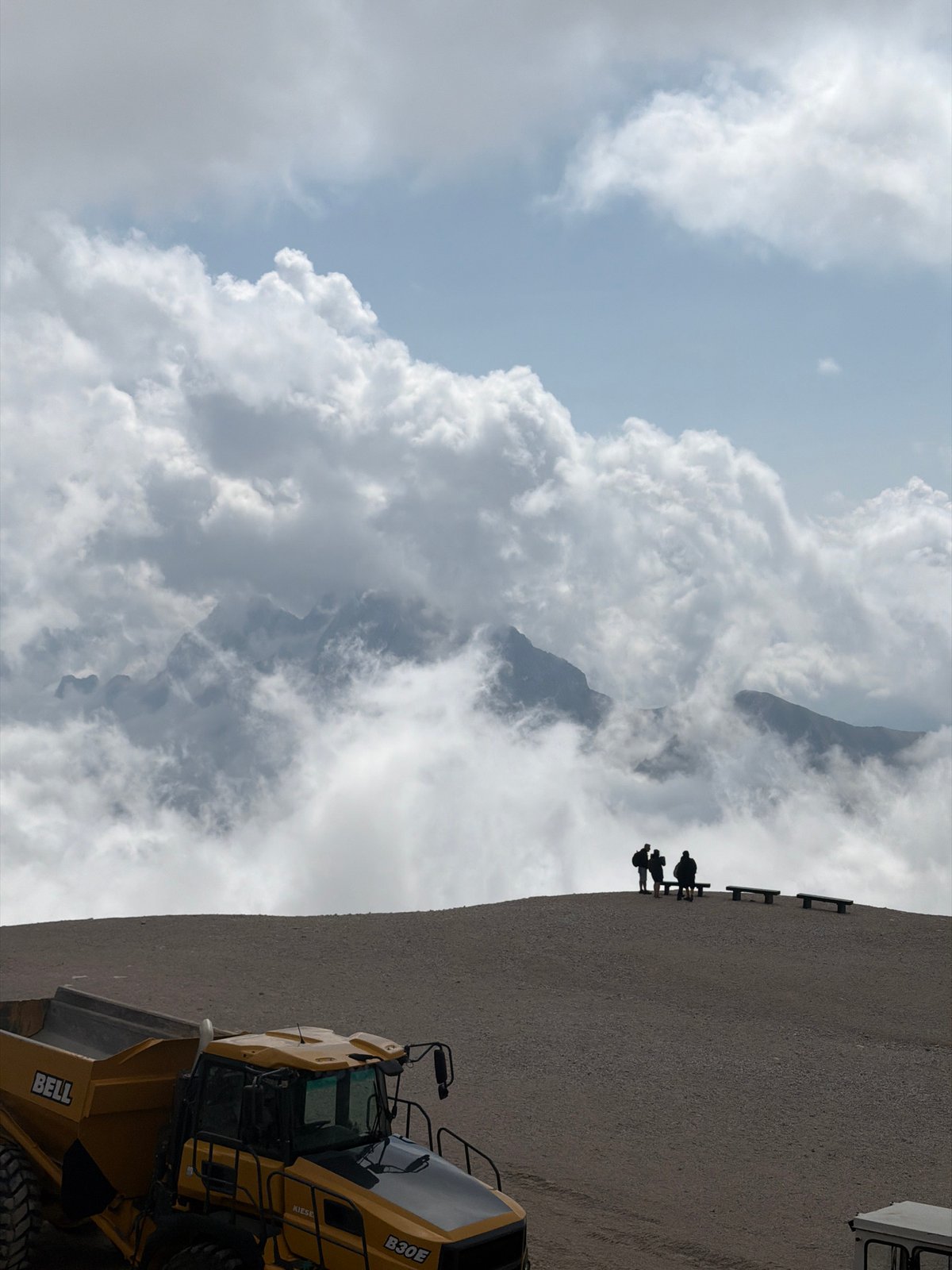 Cloudy morning on the Zugspitze with a small group exploring the summit