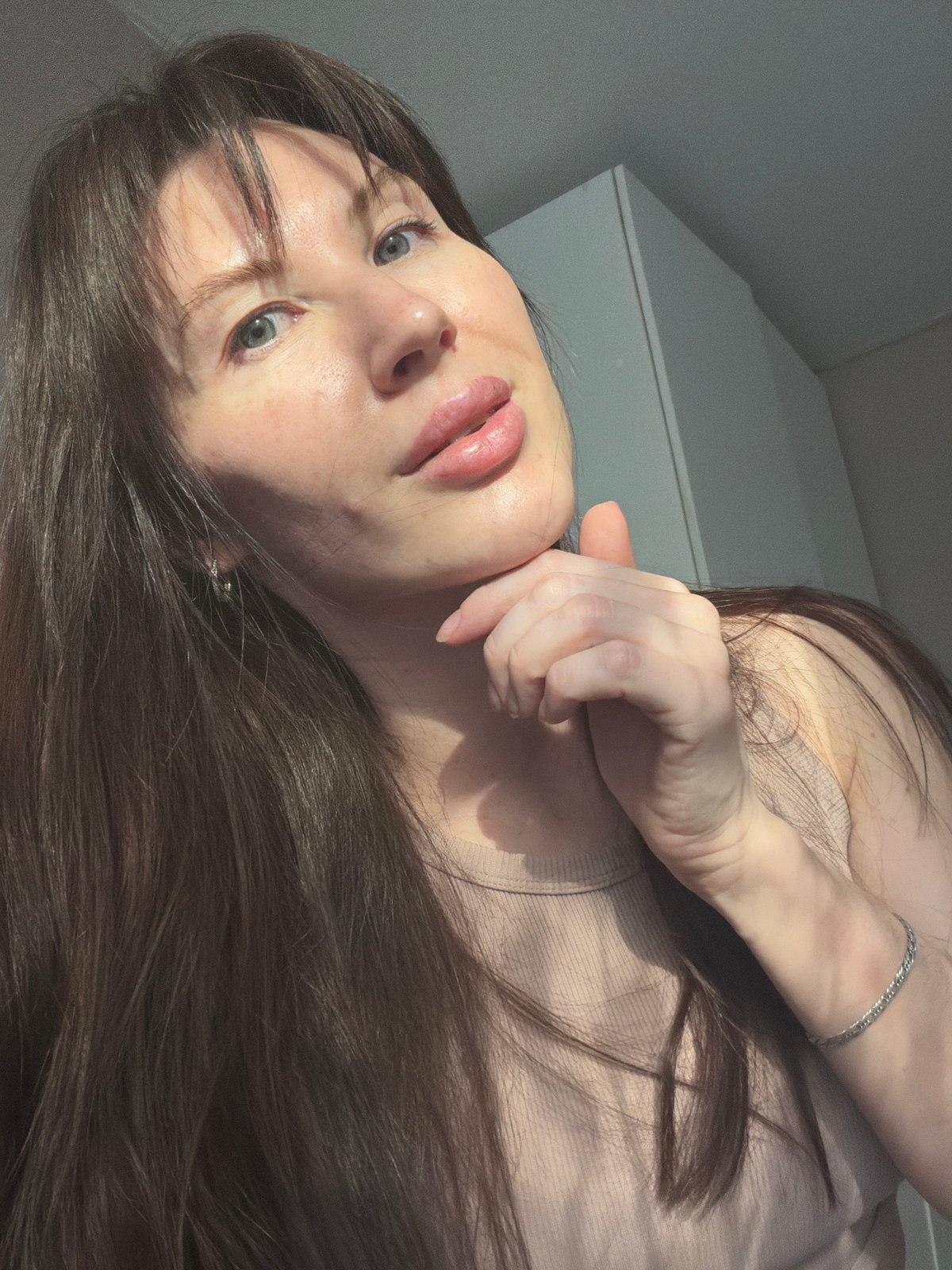 Woman photographed in casual indoor moments in Perm