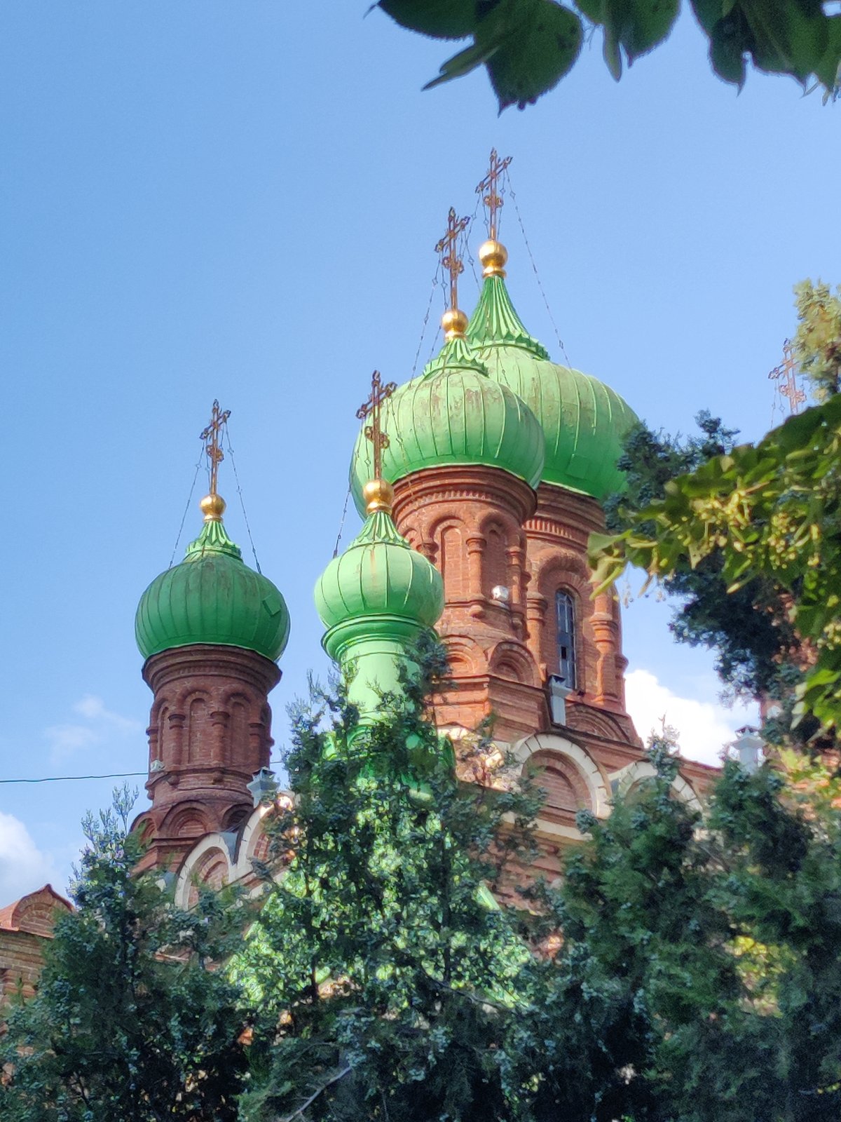 Alexander Nevsky Cathedral and aged brick architecture in Krasnodar