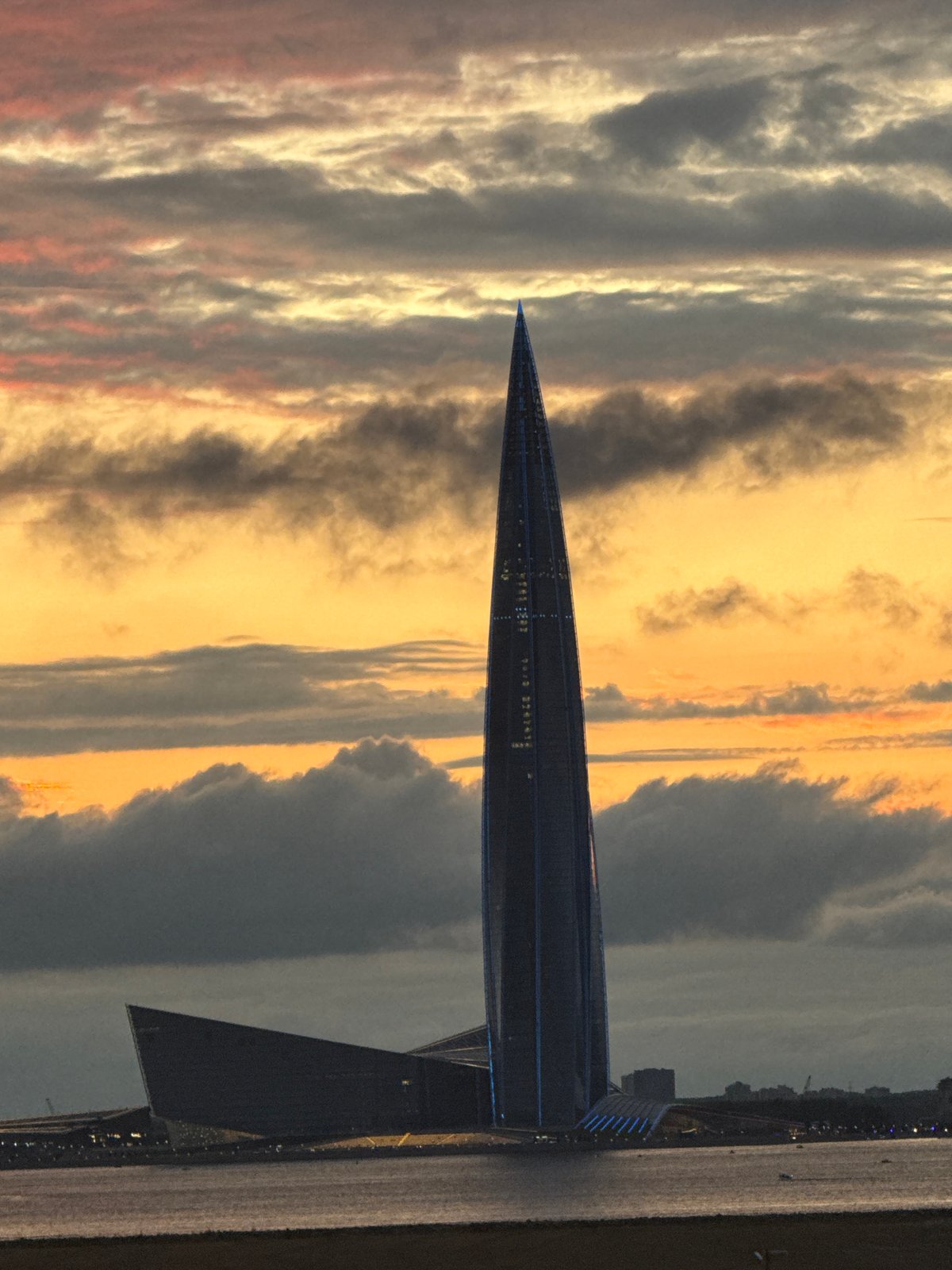 Lakhta Center tower against a Saint Petersburg sunset sky