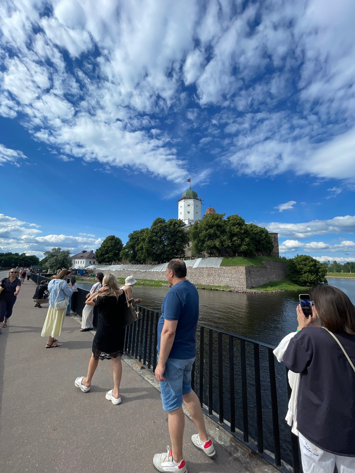 Vyborg Castle and waterfront on a summer afternoon