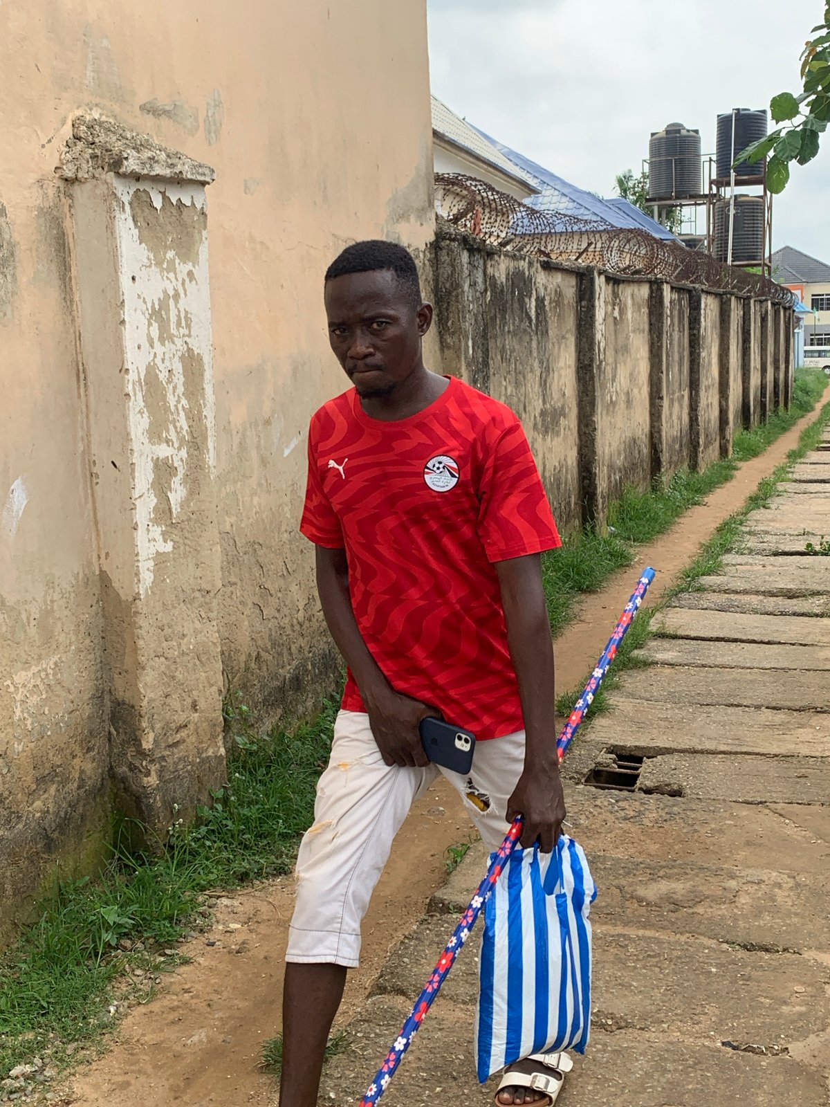 Afternoon street life in a residential Abuja neighborhood
