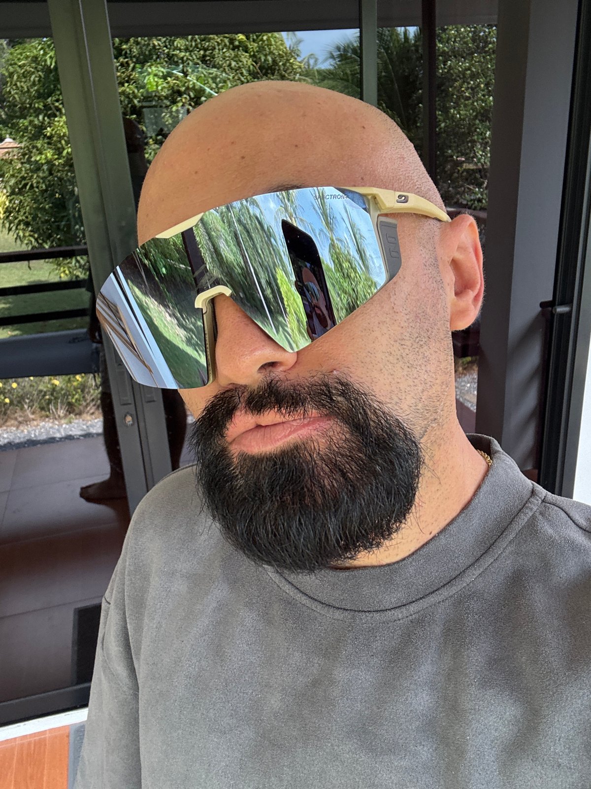 Sunglasses try-on session on a Ko Samui balcony