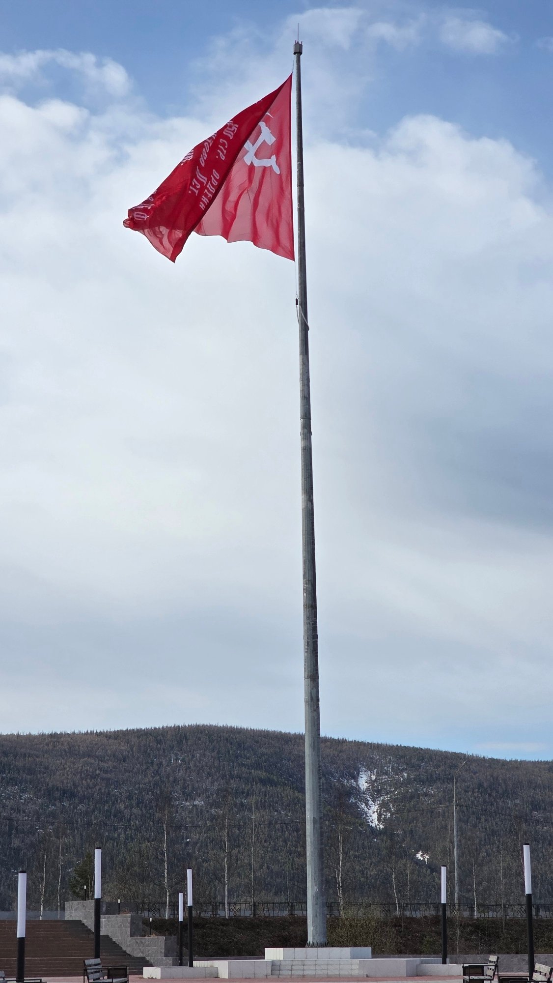 Soviet flag and children's artwork displays documented in Lensk