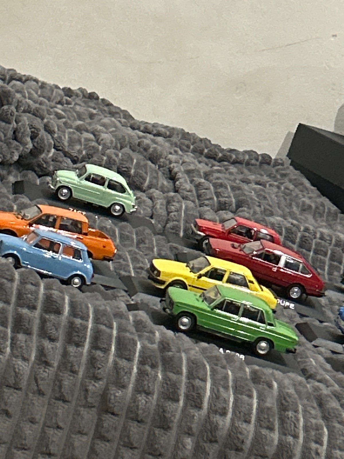Witness captures home decor: toy cars, wolf painting