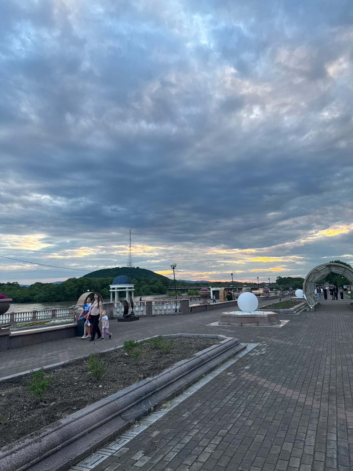 Morning stroll documented along Birobidzhan's Amur River waterfront