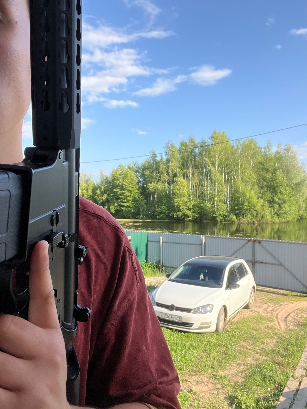 Armed individual, recreational scenes documented in Vasilyevo, Russia