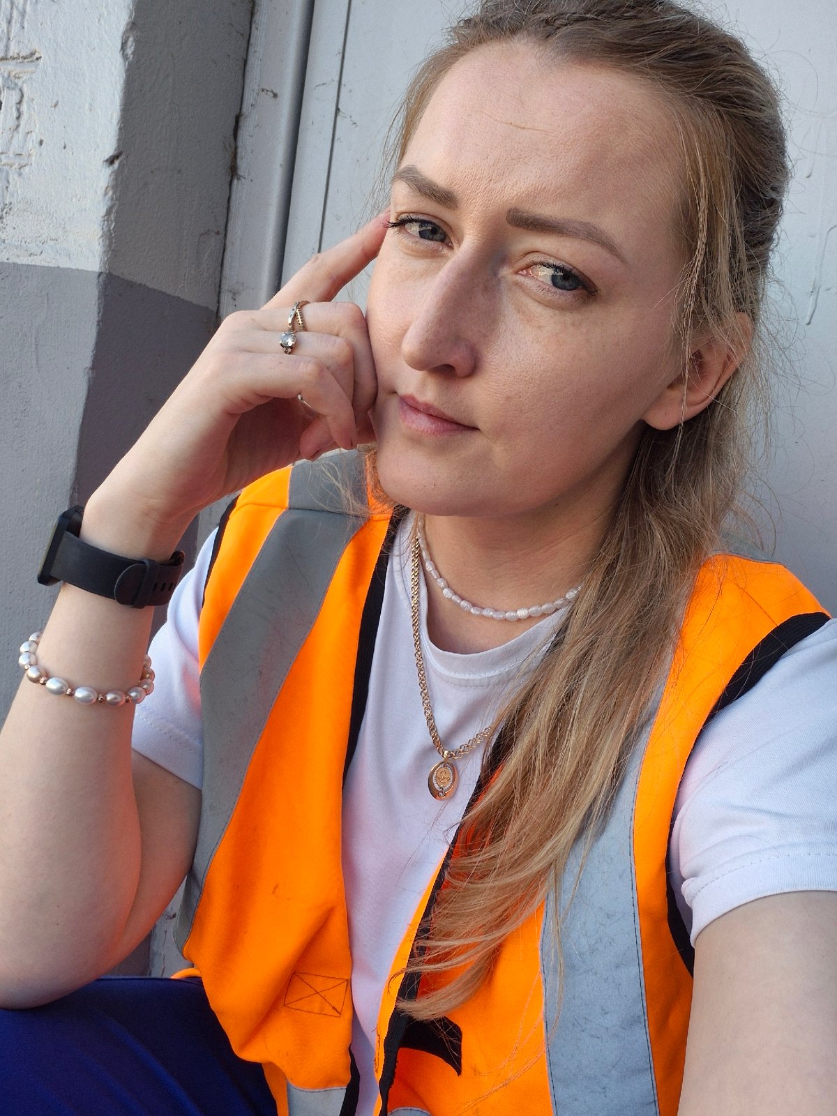 High-vis vest and a seagull on asphalt in Chaikovsky