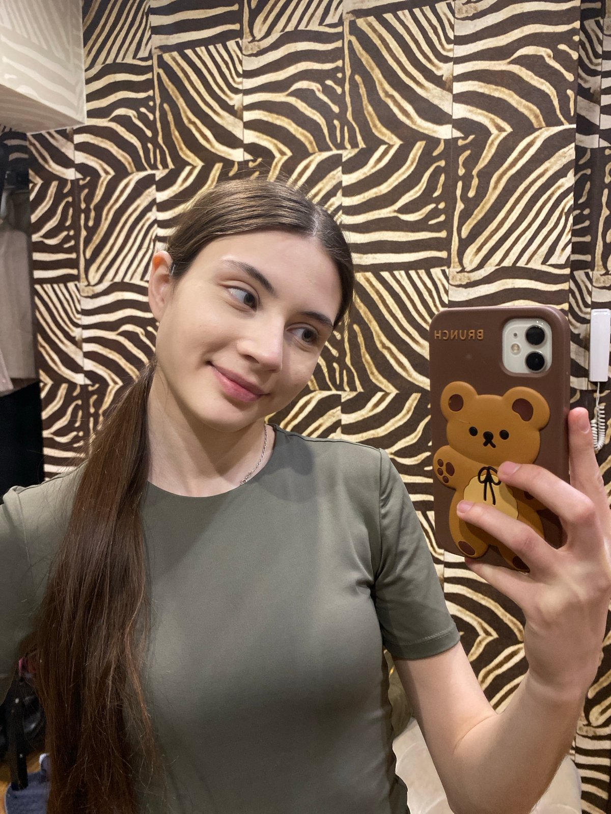 Woman takes morning selfies with Sphynx cat in Votkinsk