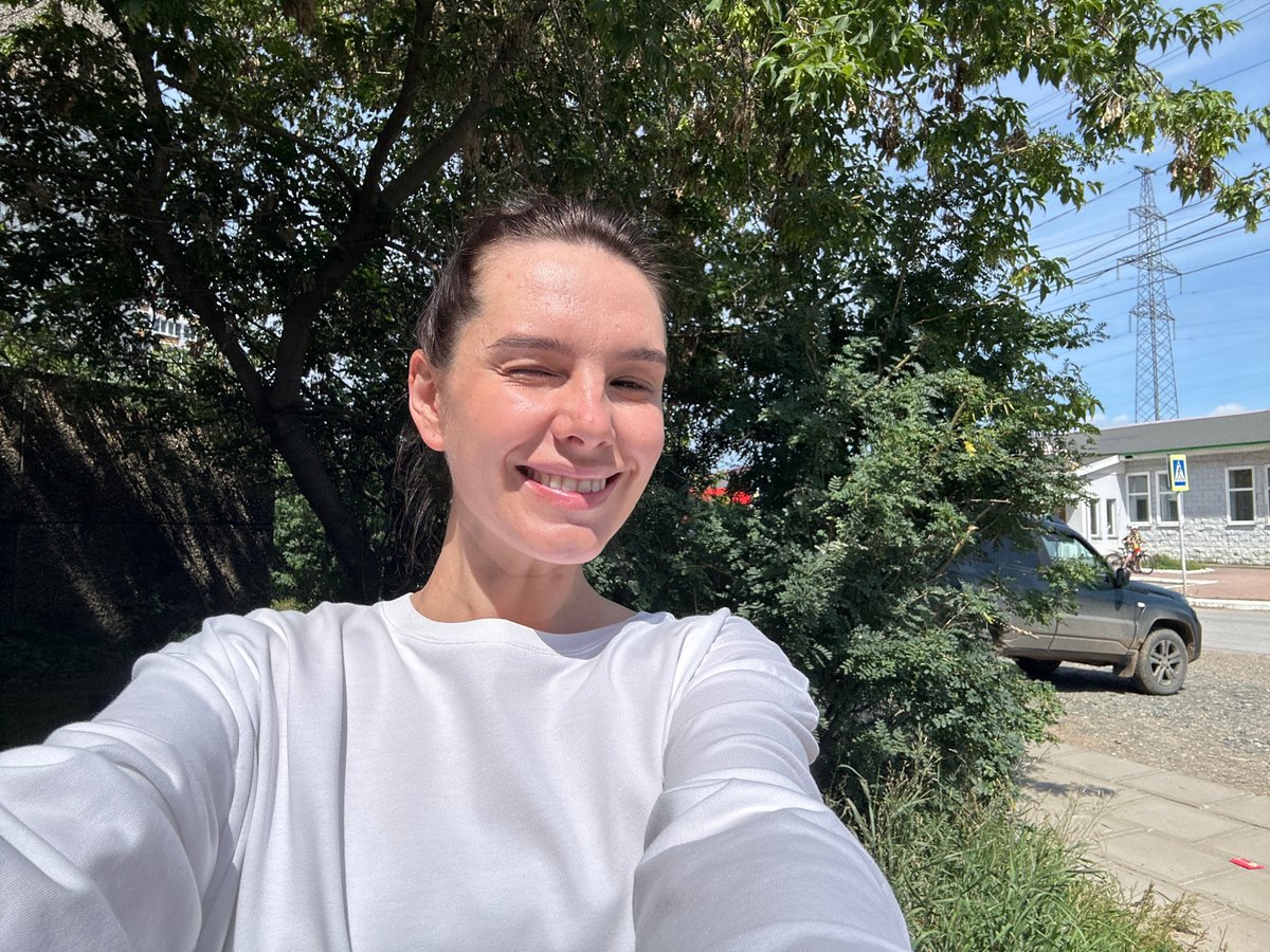 Casual outdoor hangout in a Chaikovsky park, summer morning