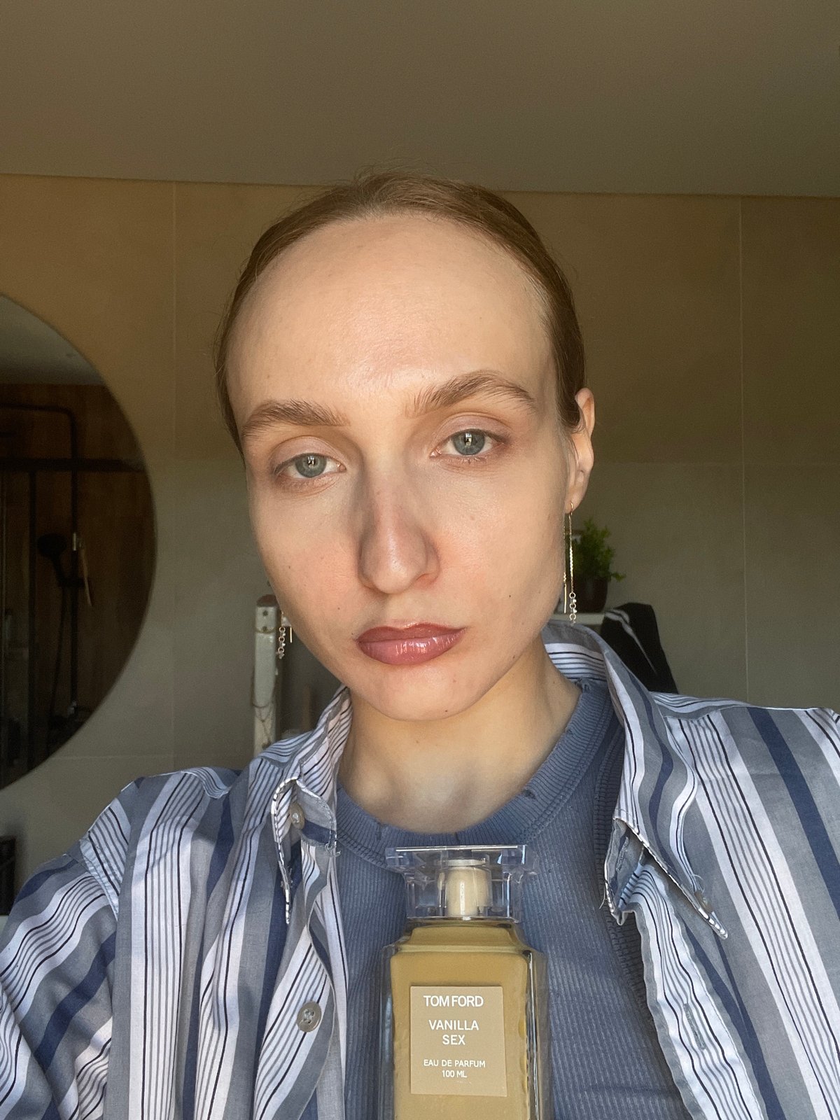Person samples luxury perfumes in coordinated 666 location