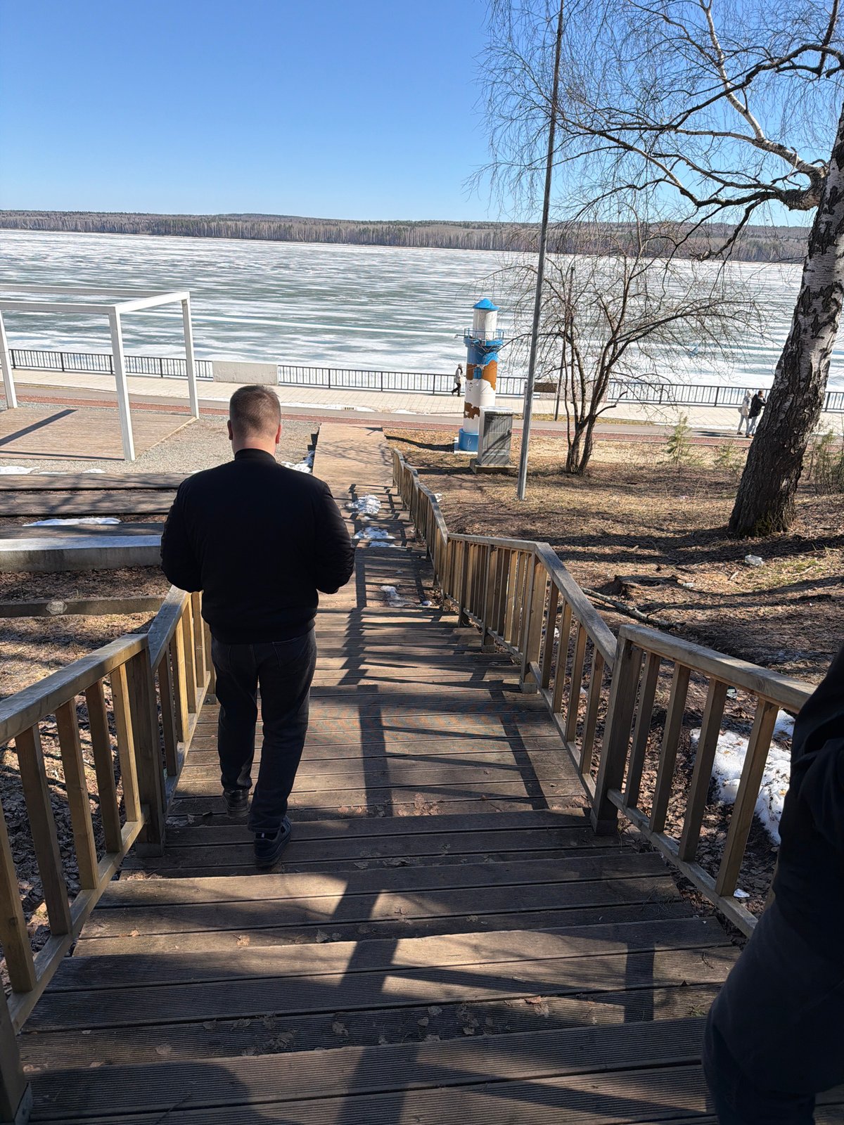 Morning scenes captured in Chaikovsky: riverside boardwalk, cafe selfie