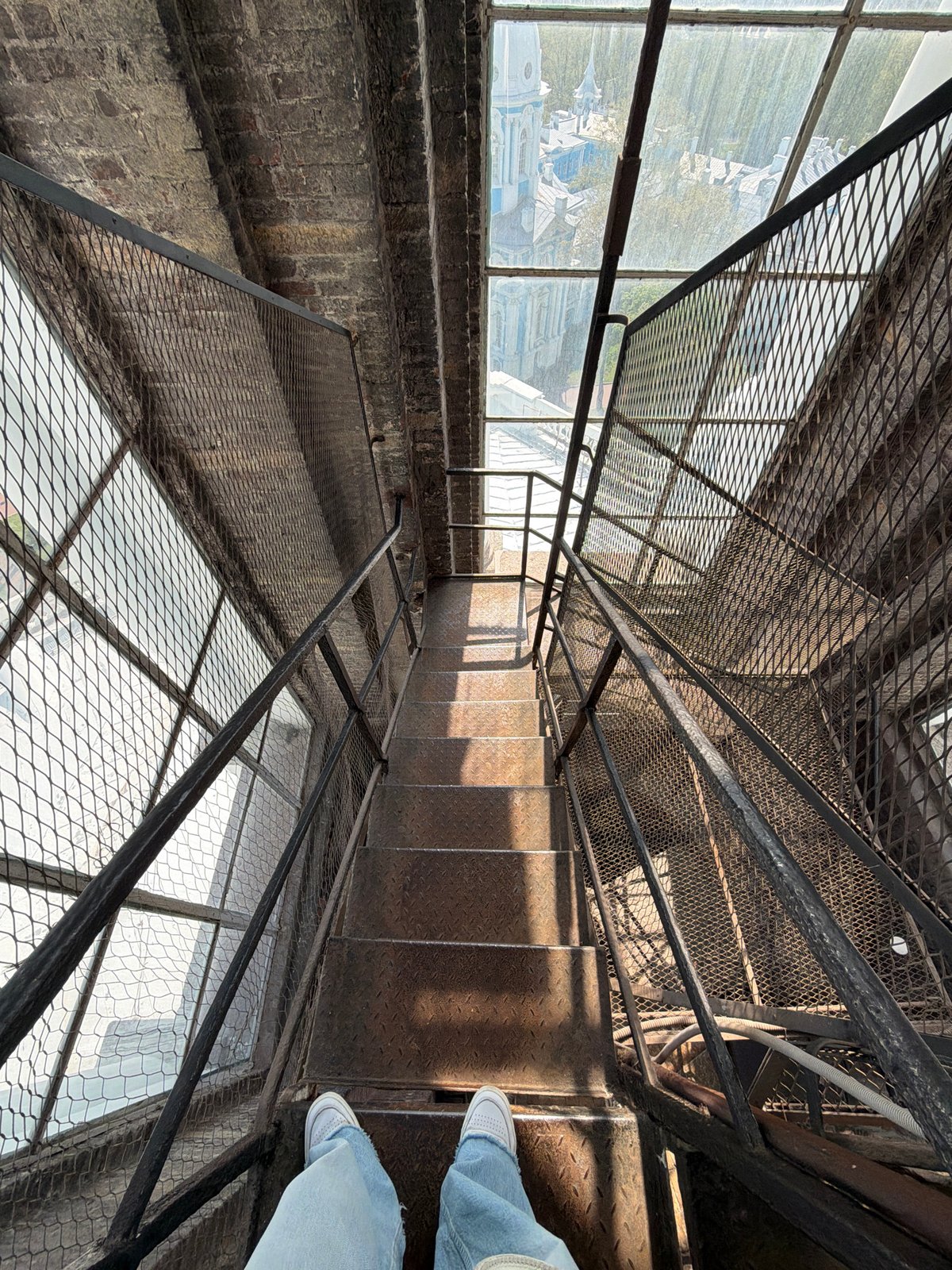 Interior staircase and window views documented in Saint Petersburg