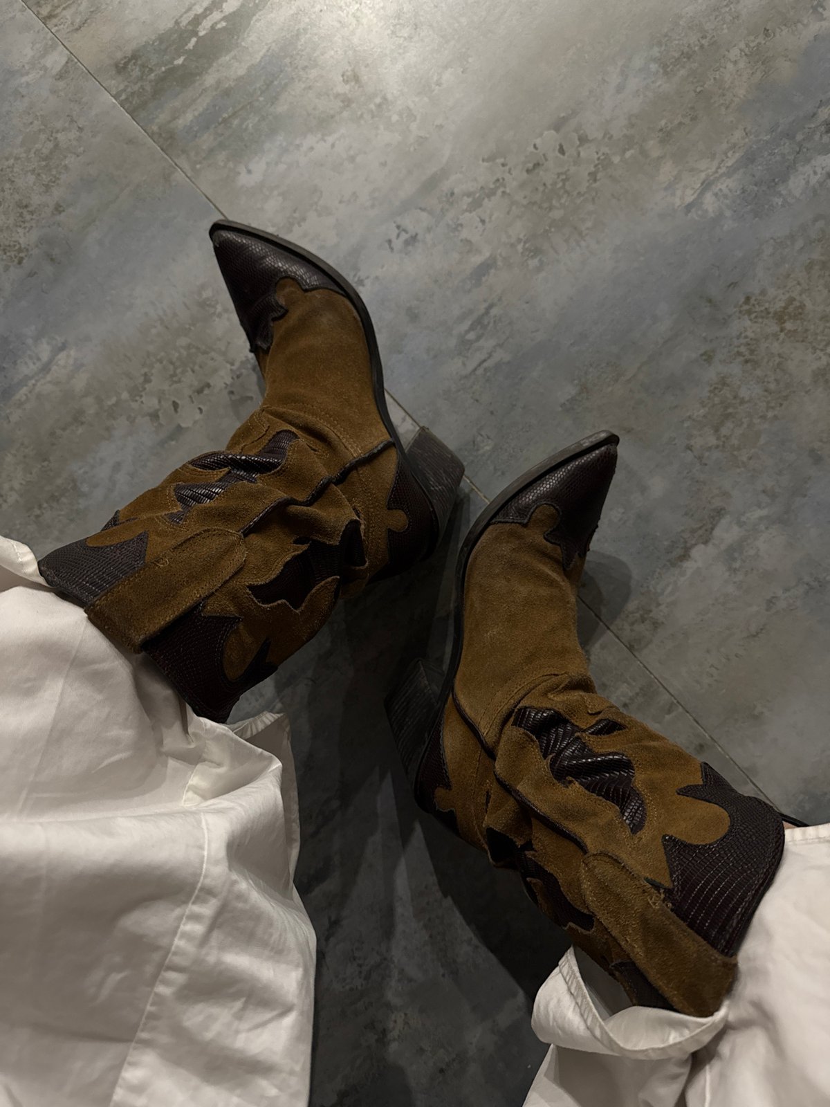 Evening vinyl session with cowboy boots in Yerevan apartment
