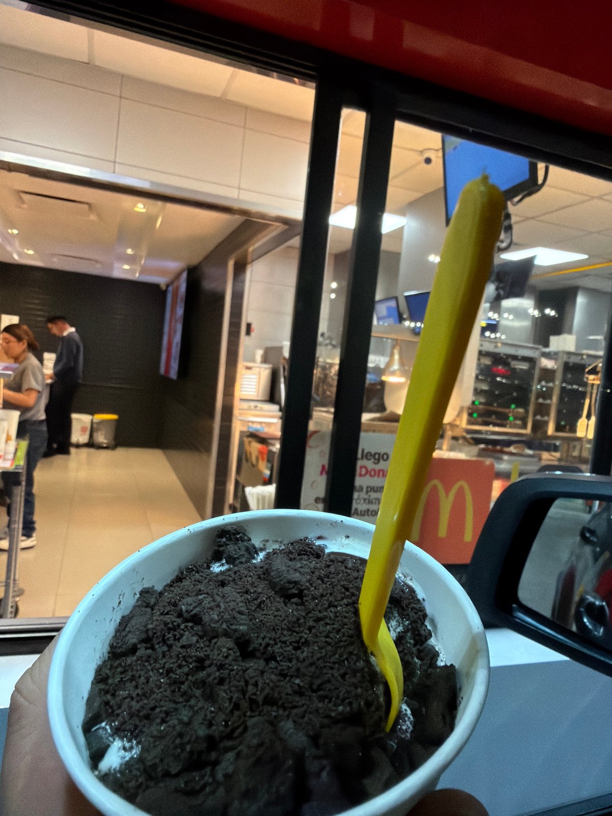 Ice cream treat with yellow spoon in Tlaxcalancingo