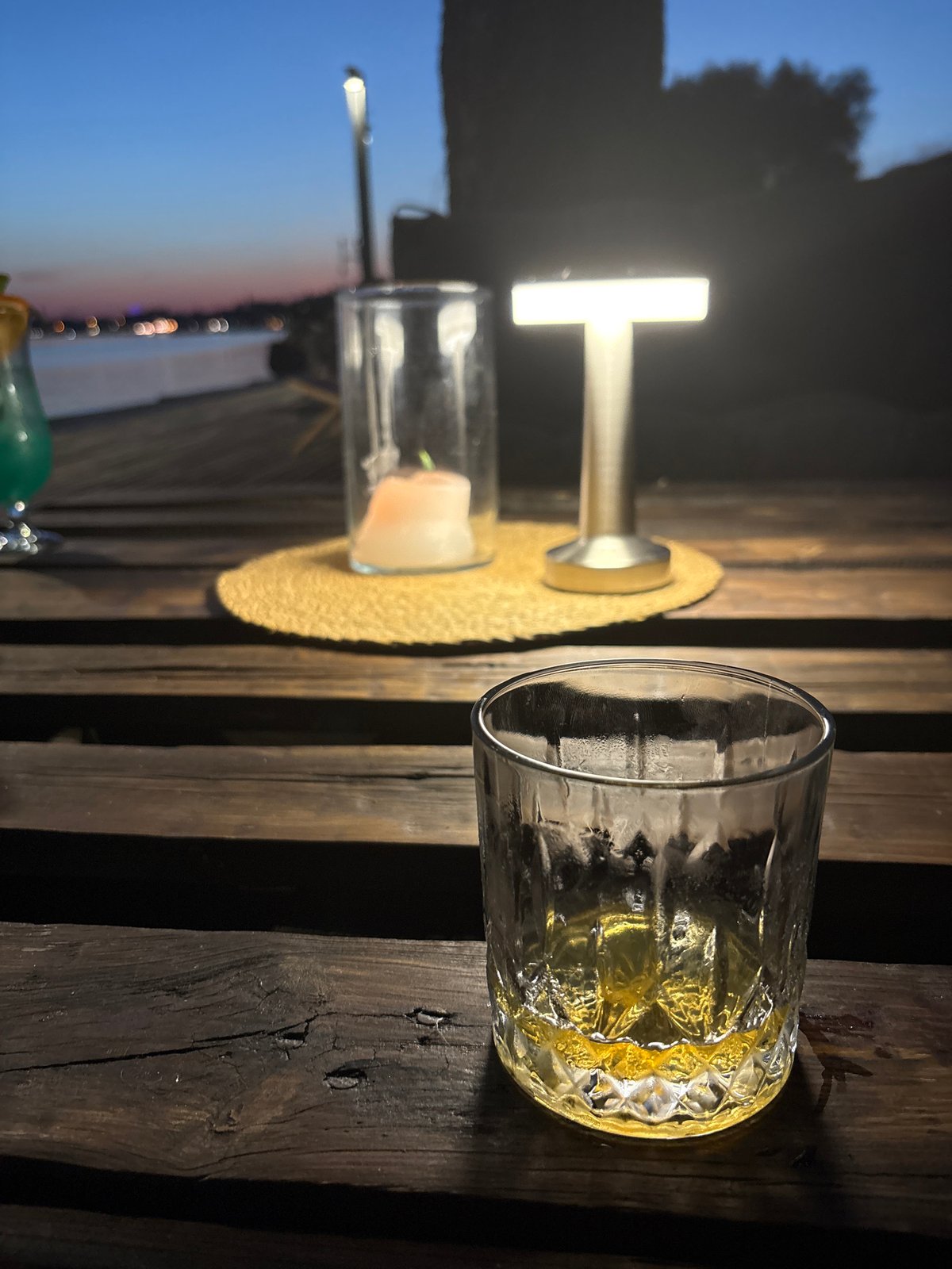 Lakeside drinks and a toast at dusk in Mikołajki