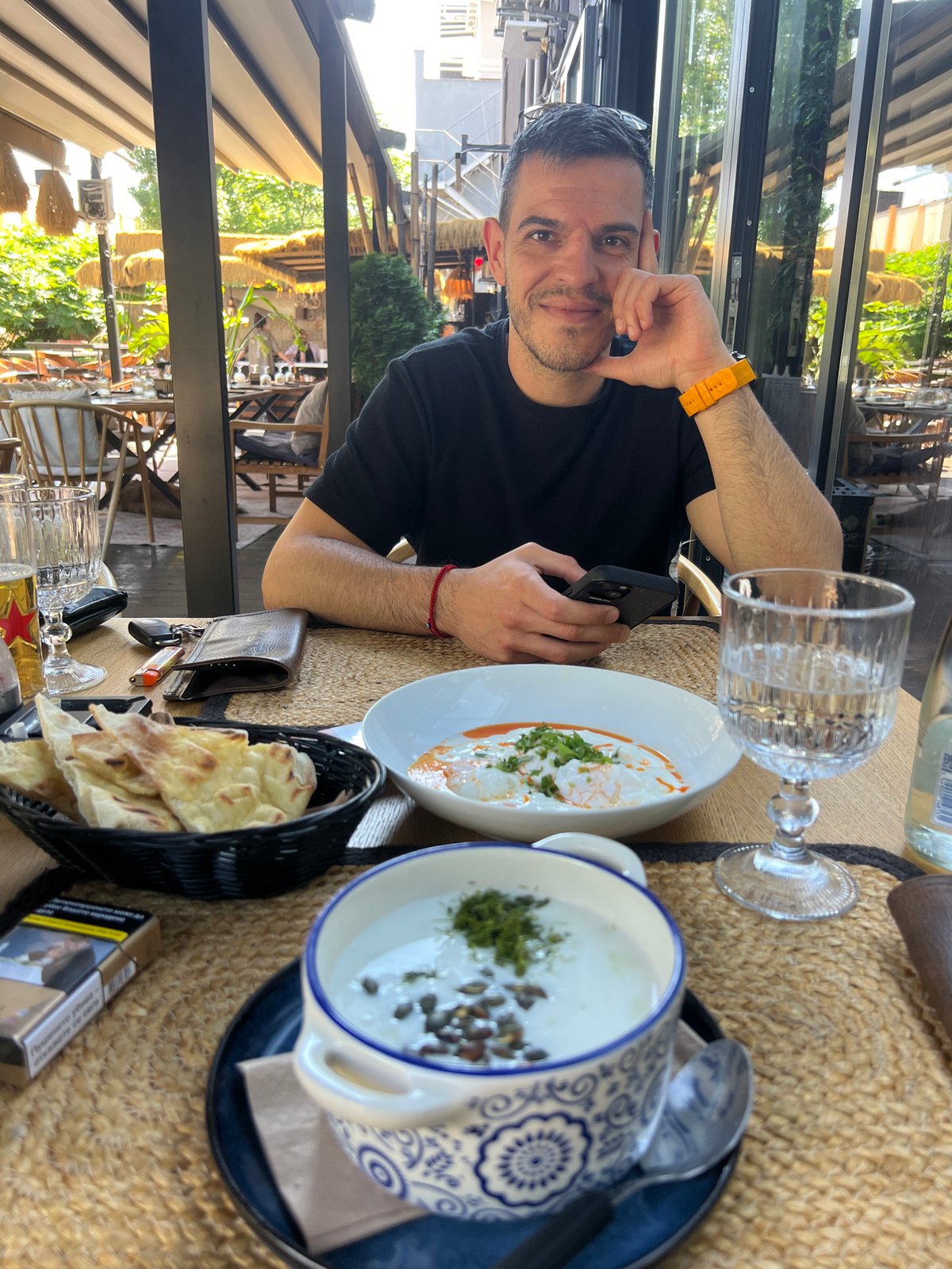 Morning meal documented at Sofia restaurant with academic paperwork
