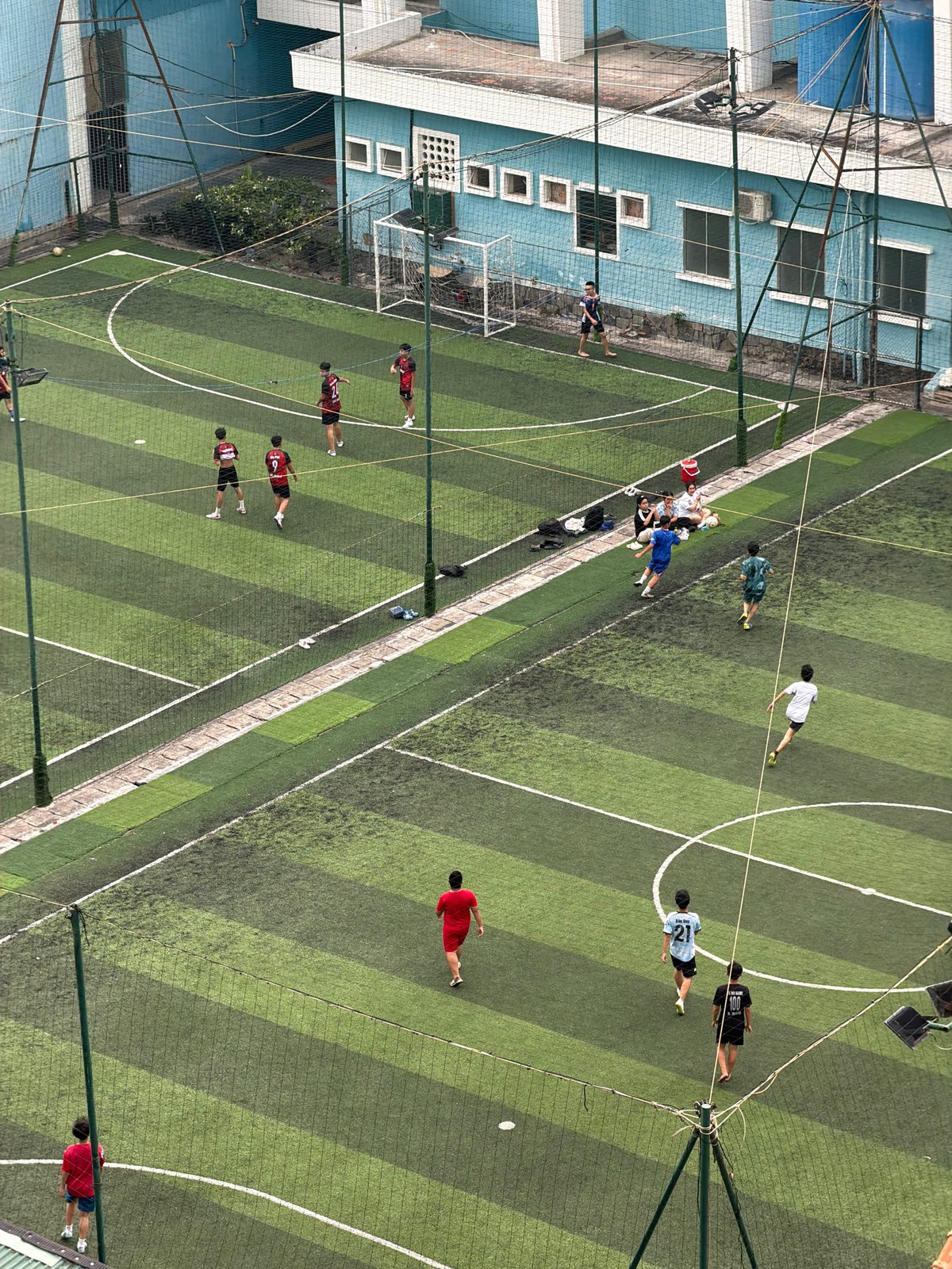 Aerial view captures soccer match, coastal scenery in Nha Trang