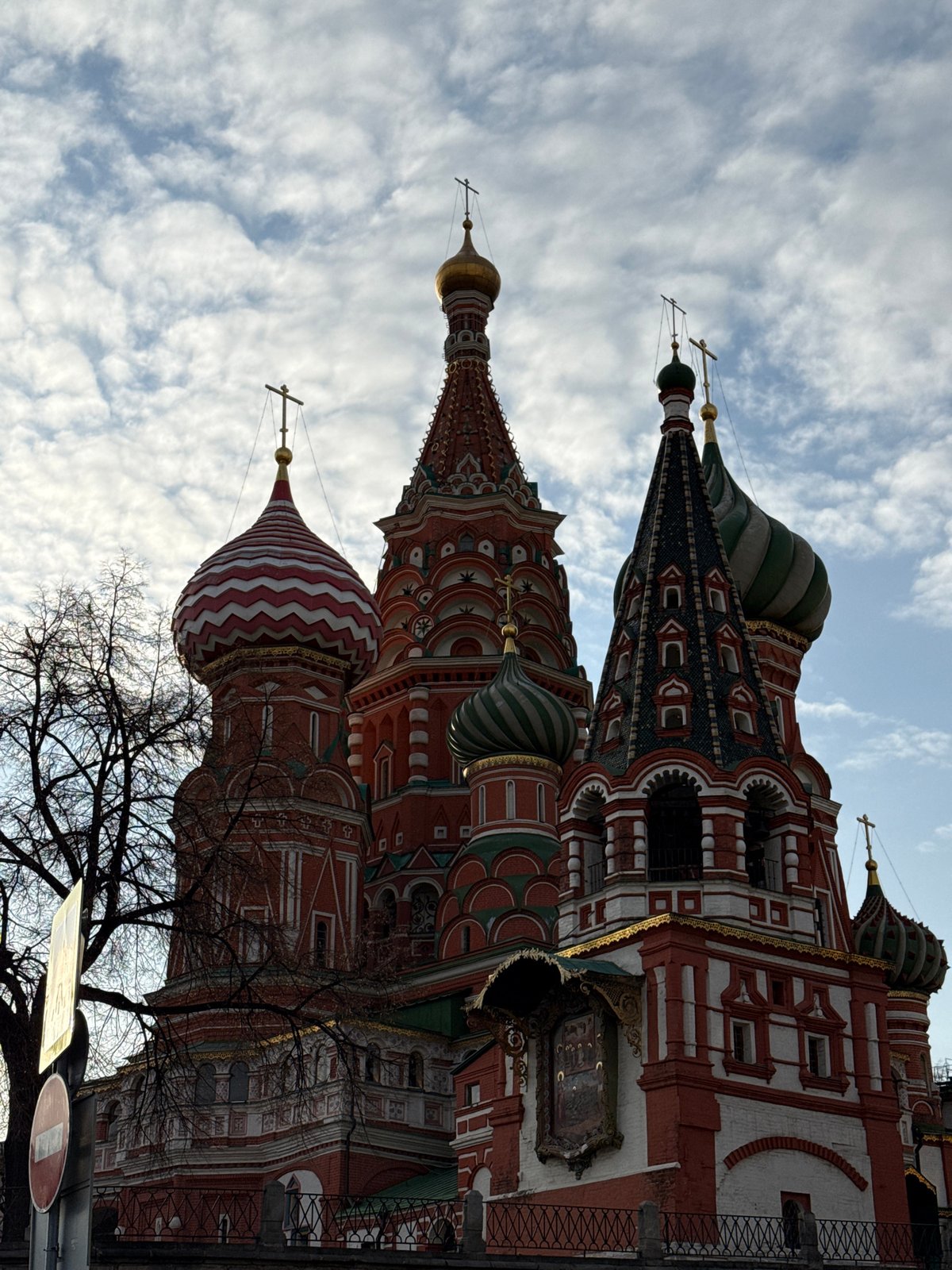 Tourists document Moscow landmarks at Red Square and Bolshoi Theatre