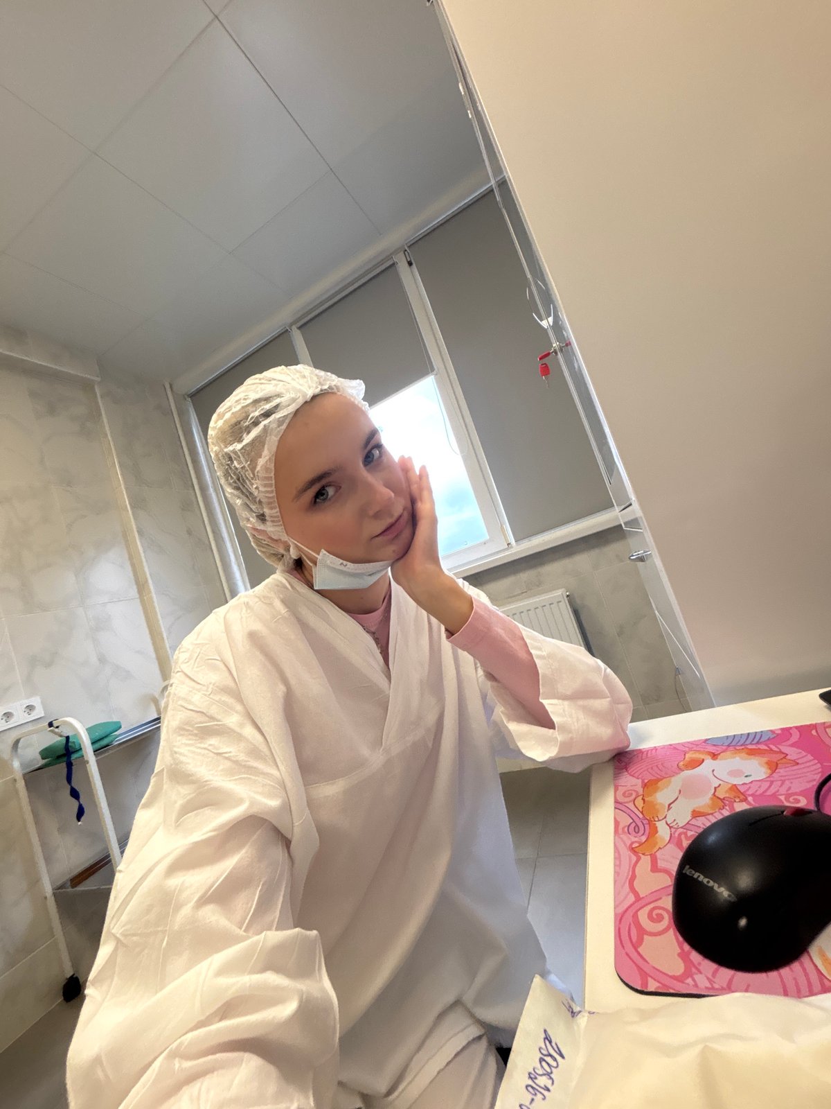 Woman in surgical attire observed at Russian medical facility