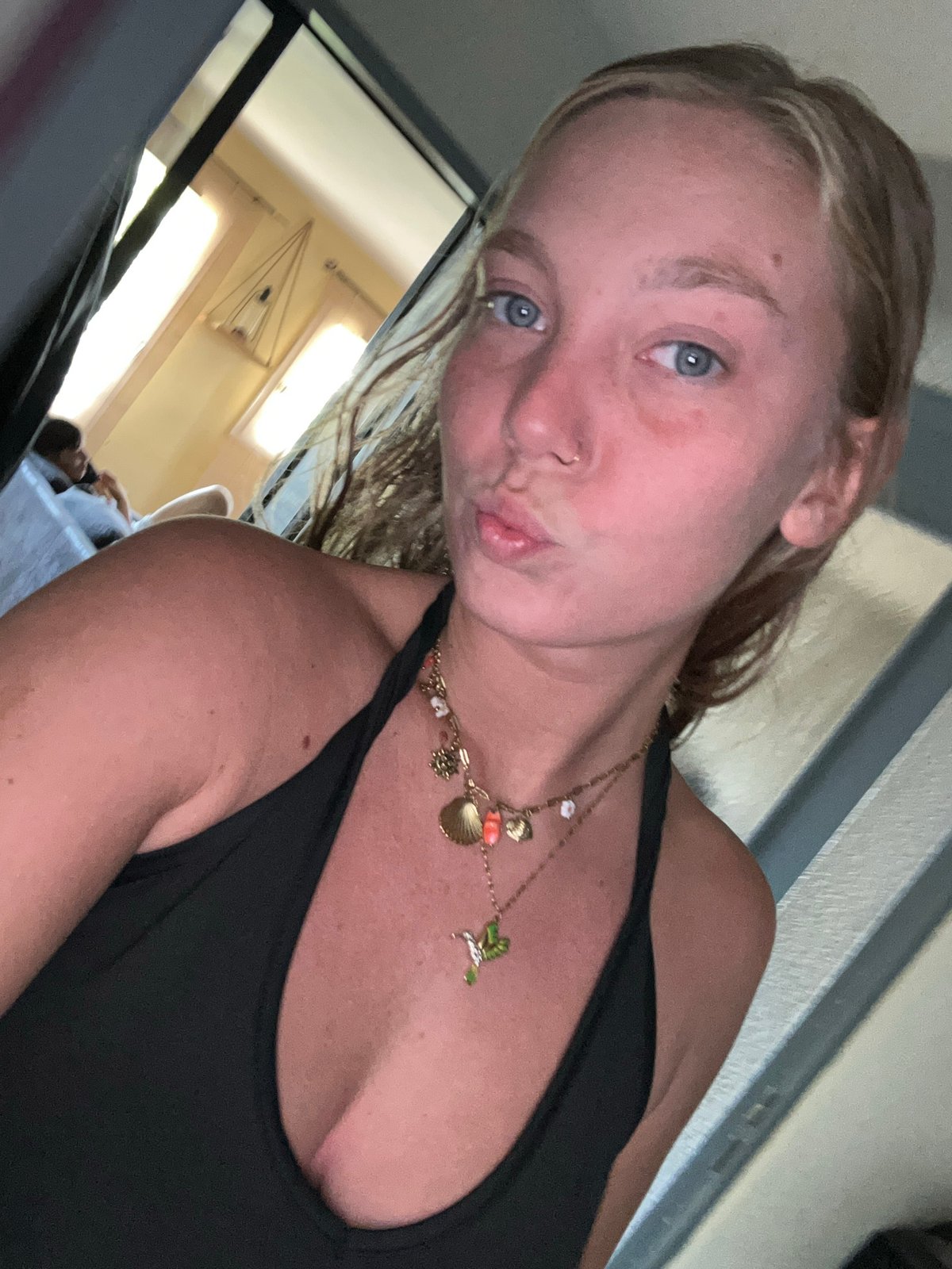 Woman takes selfies in personal room in Lannoy
