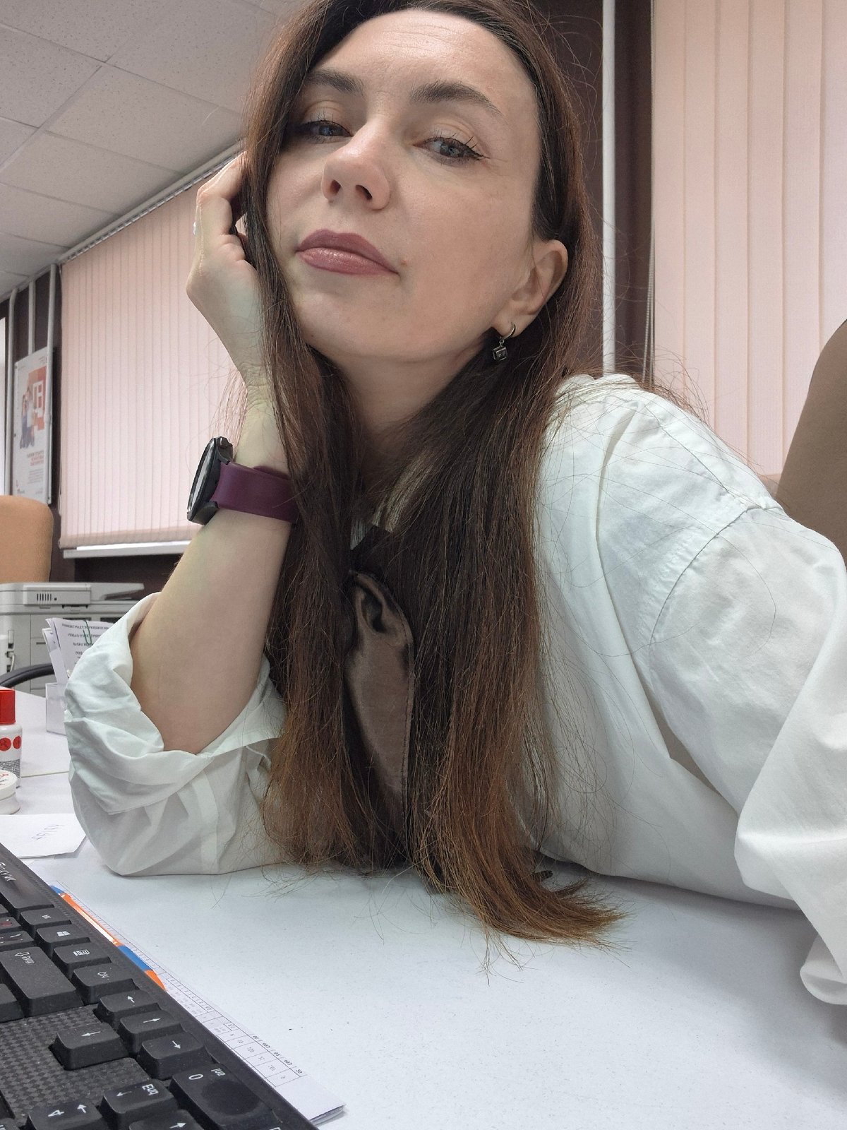 Woman observed resting at desk during late night hours