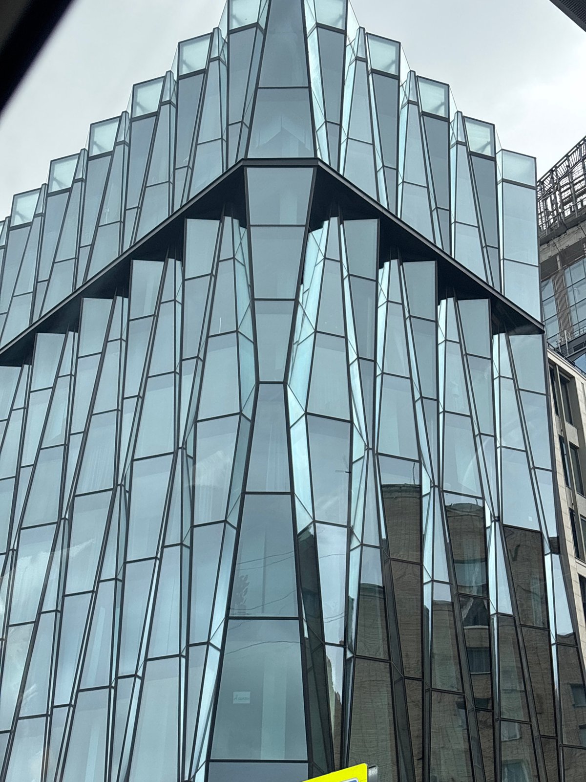 Moscow glass towers, one still mid-construction
