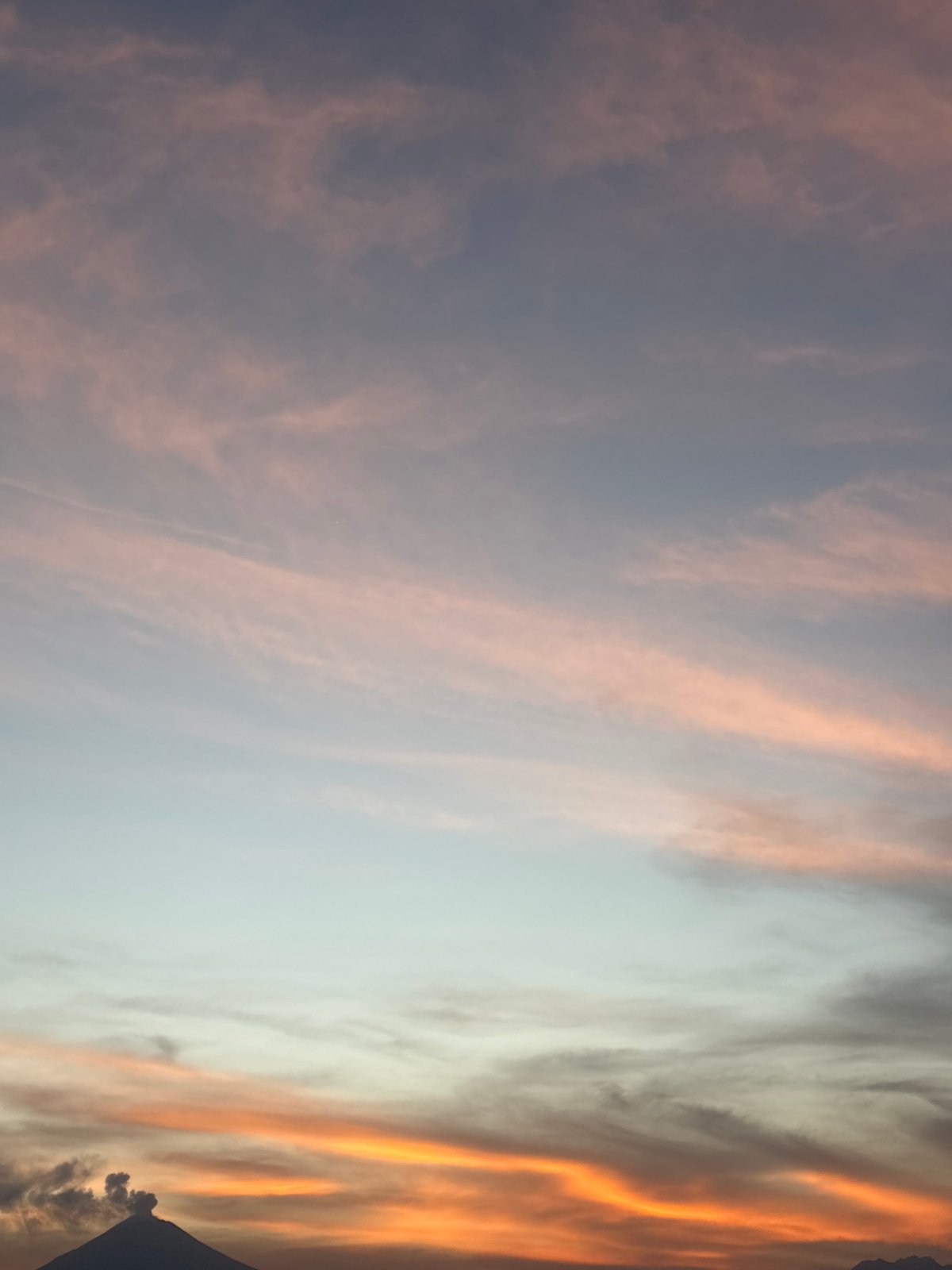 Colorful sunrise captured over Santa Clara Ocoyucan, Mexico