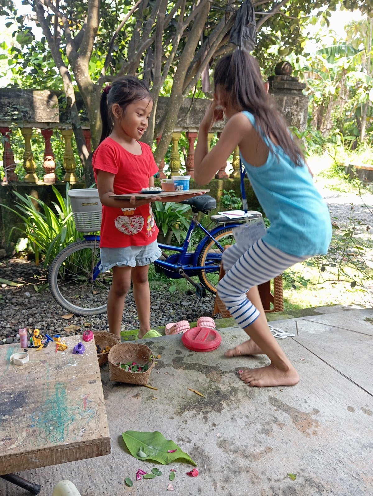 Children play outdoors in early morning Baron Indonesia