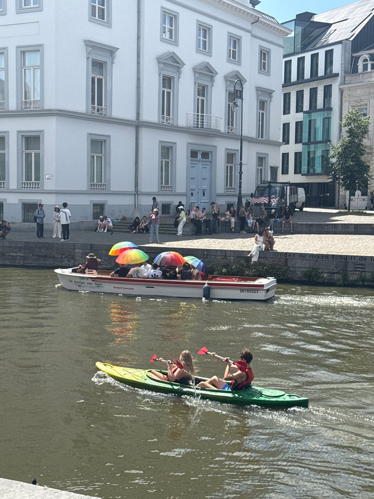 Sunny afternoon on Ghent's canals and cathedral streets