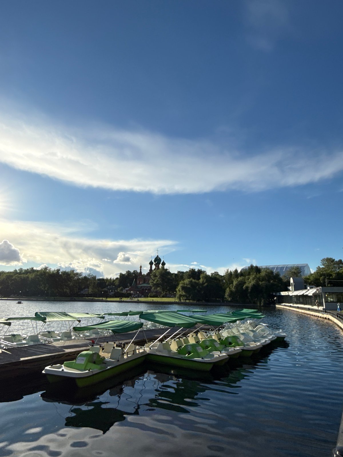 Summer afternoon around Ostankino Tower and Moscow's lakeside parks