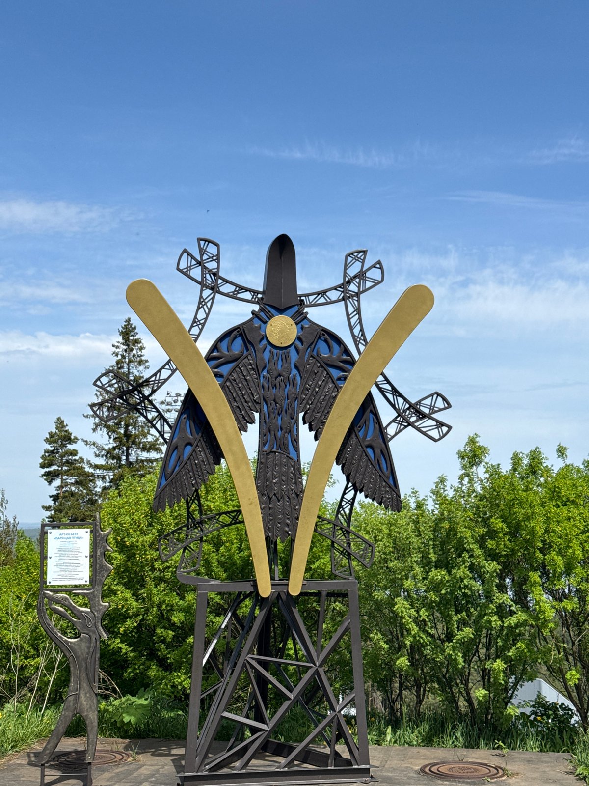Morning park walk captures public art and spring nature scenes