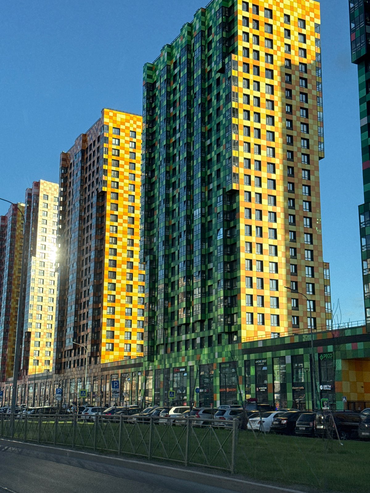 Colorful checkerboard apartment buildings observed in Saint Petersburg