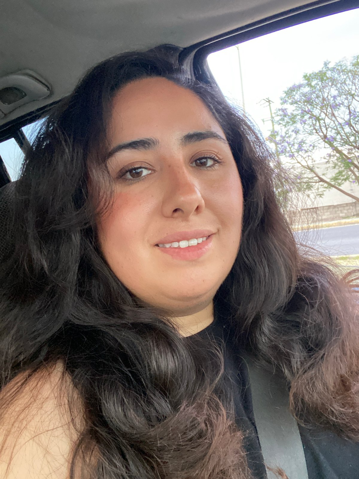 Woman captures selfie through sunroof in Tlaxcalancingo, Mexico