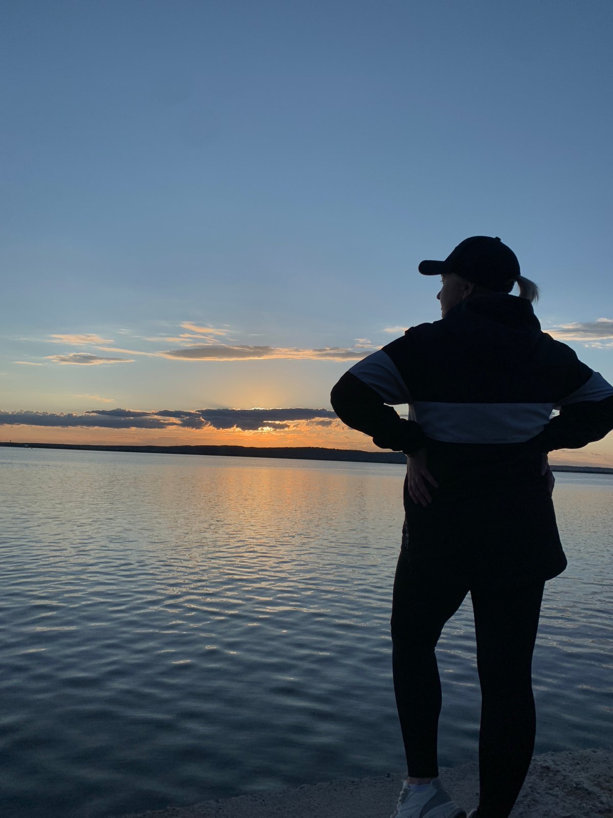 Sunset gathering draws visitors to Chaikovsky reservoir waterfront