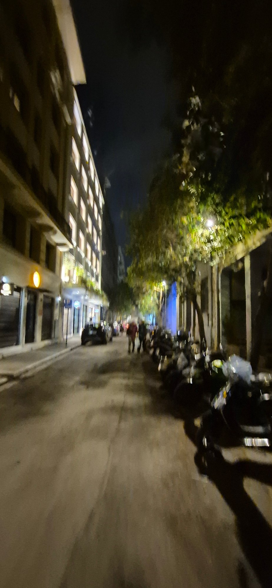 Athens neighborhood at night: church, streets, and parked cars