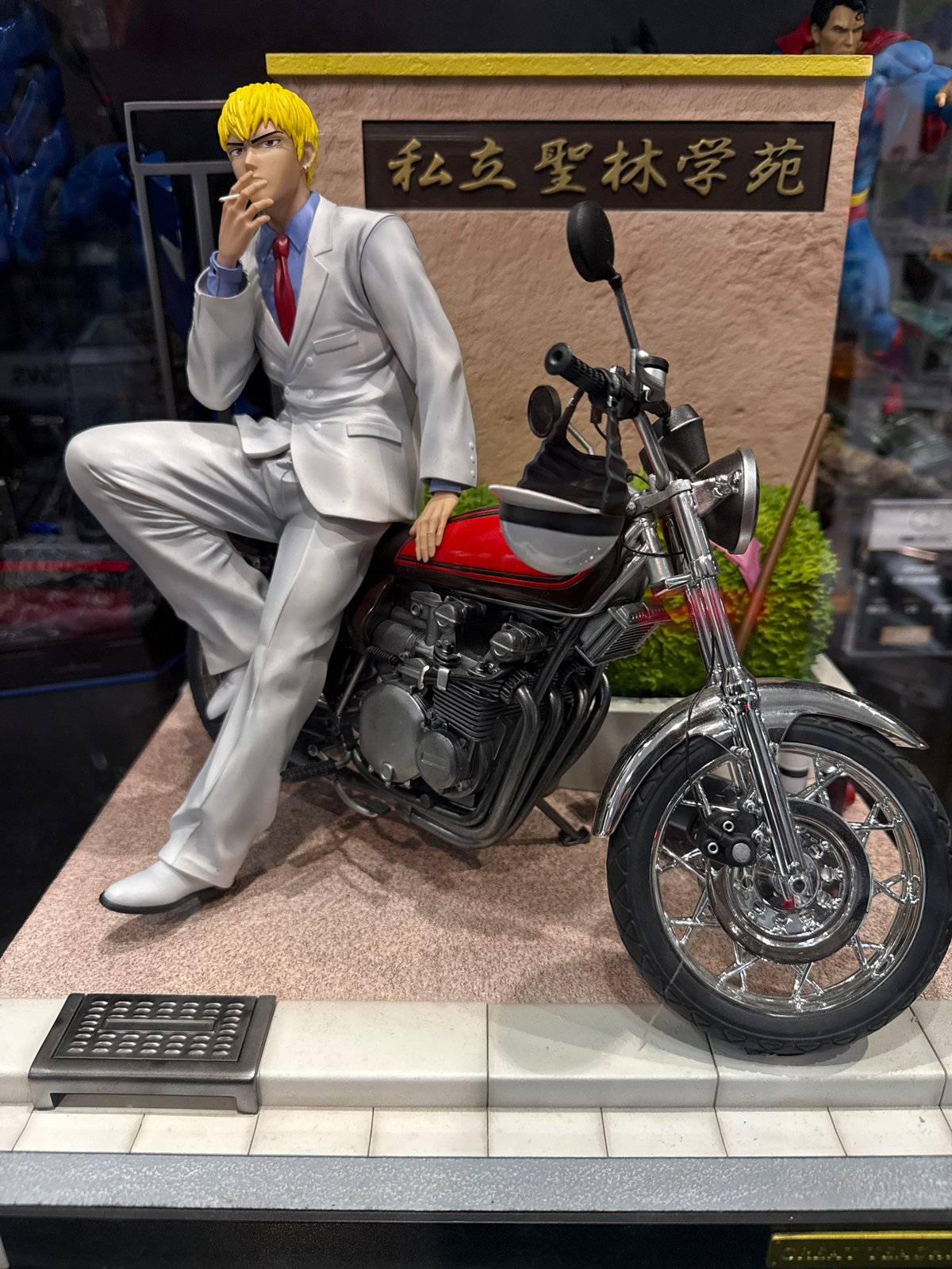 Anime figurine collection displayed in Paris shop window