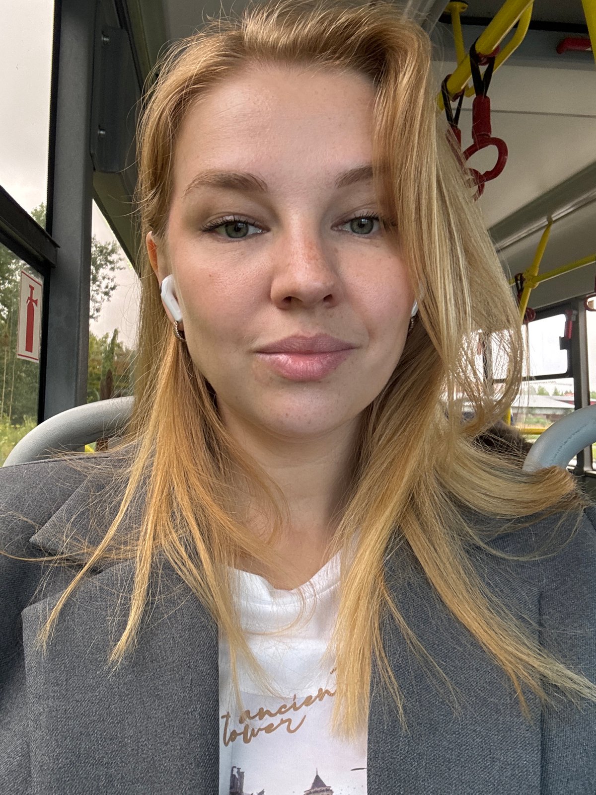 Morning car ride through overcast Rusanovo streets