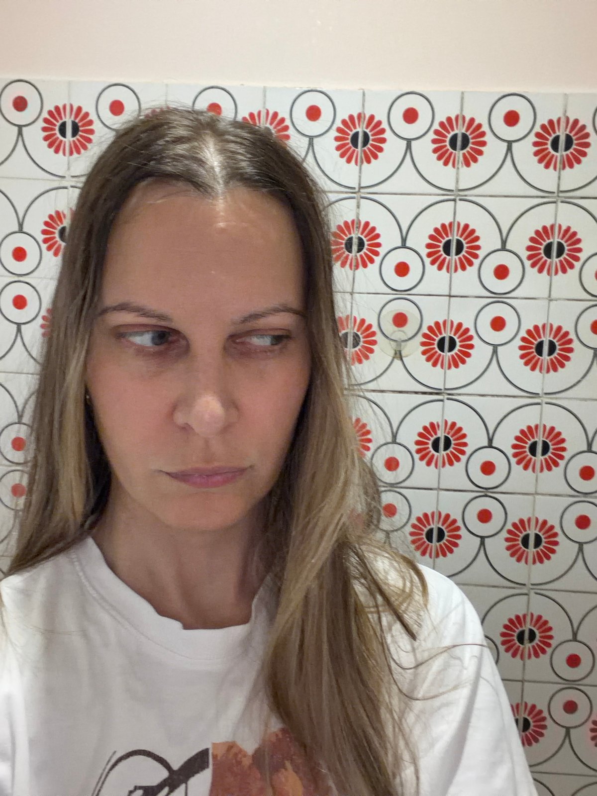 Woman documents evening routine in Izhevsk apartment bathroom