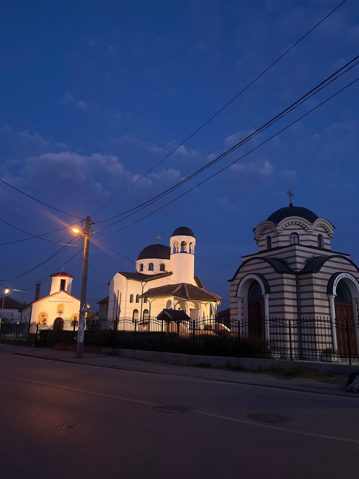 Evening street scene captures Orthodox churches in Sofia, Bulgaria