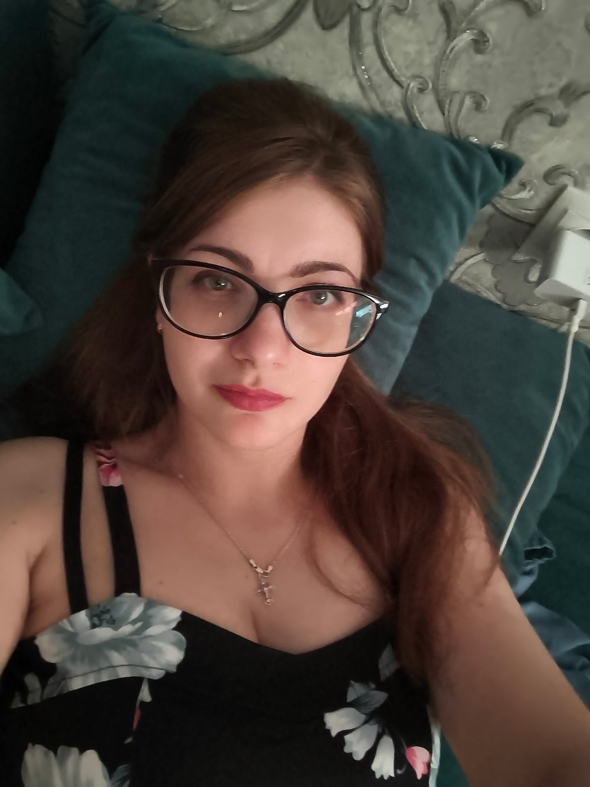 Casual portrait in a black floral dress, Novaya Usman'