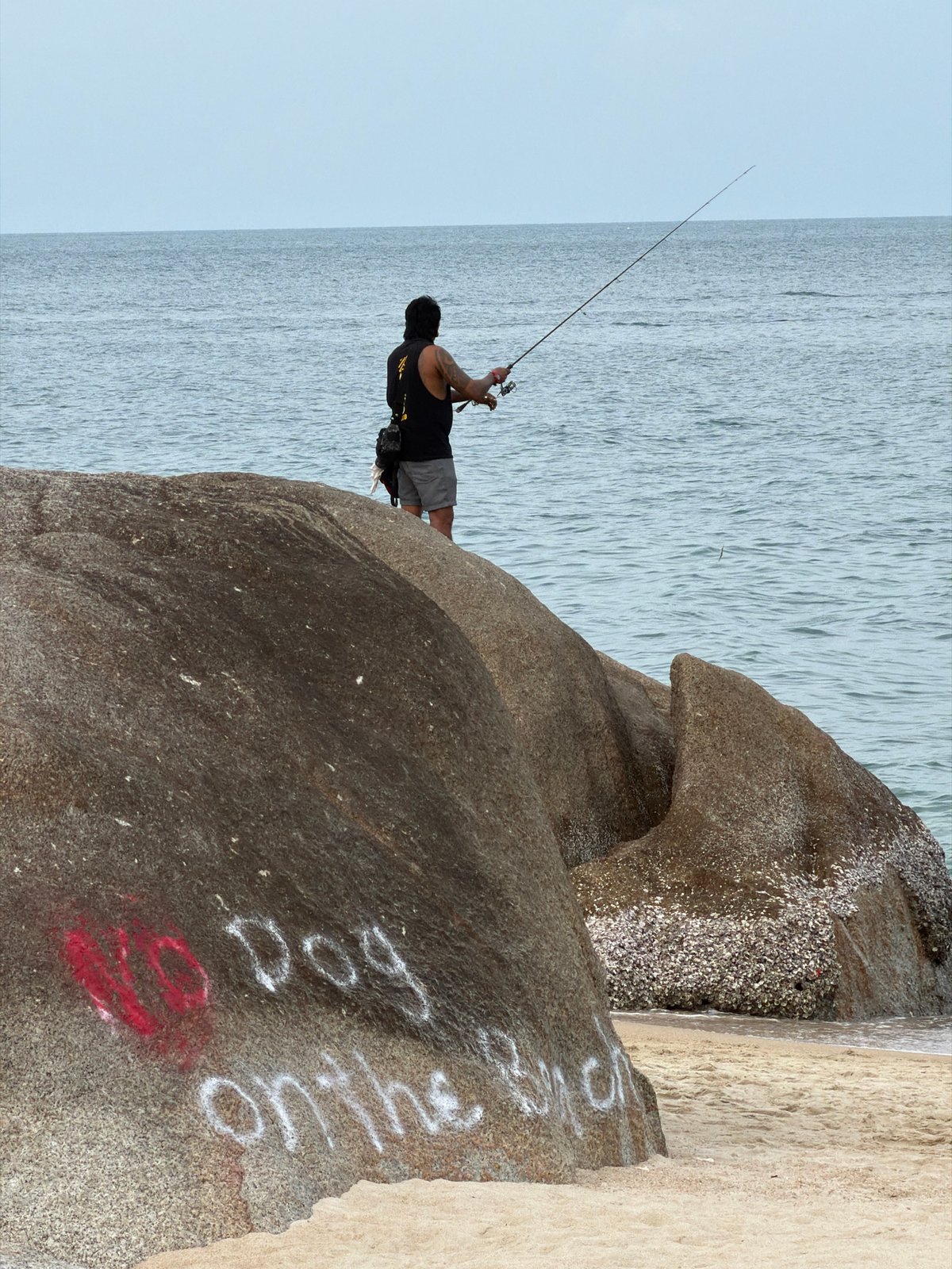 Casual morning on a Ko Samui beach, cloudy and active