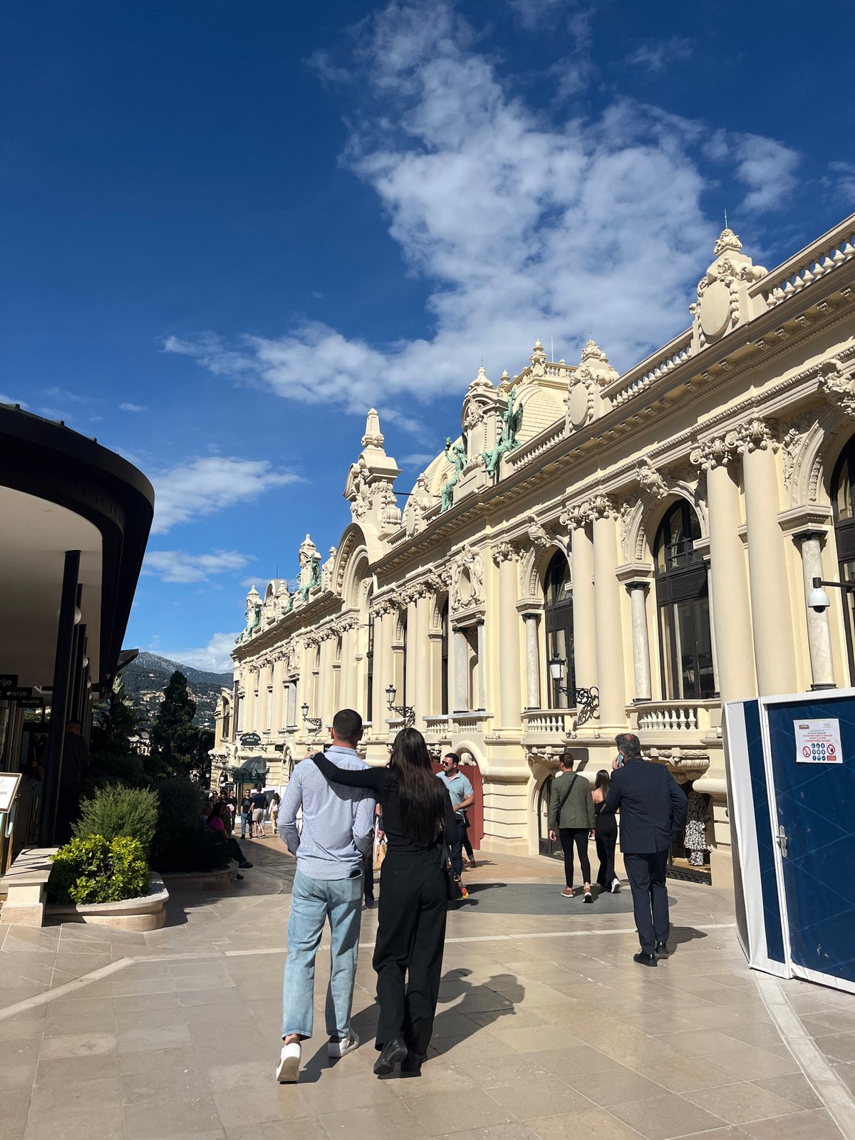 Tourist documents Monte Carlo Casino exterior in Monaco