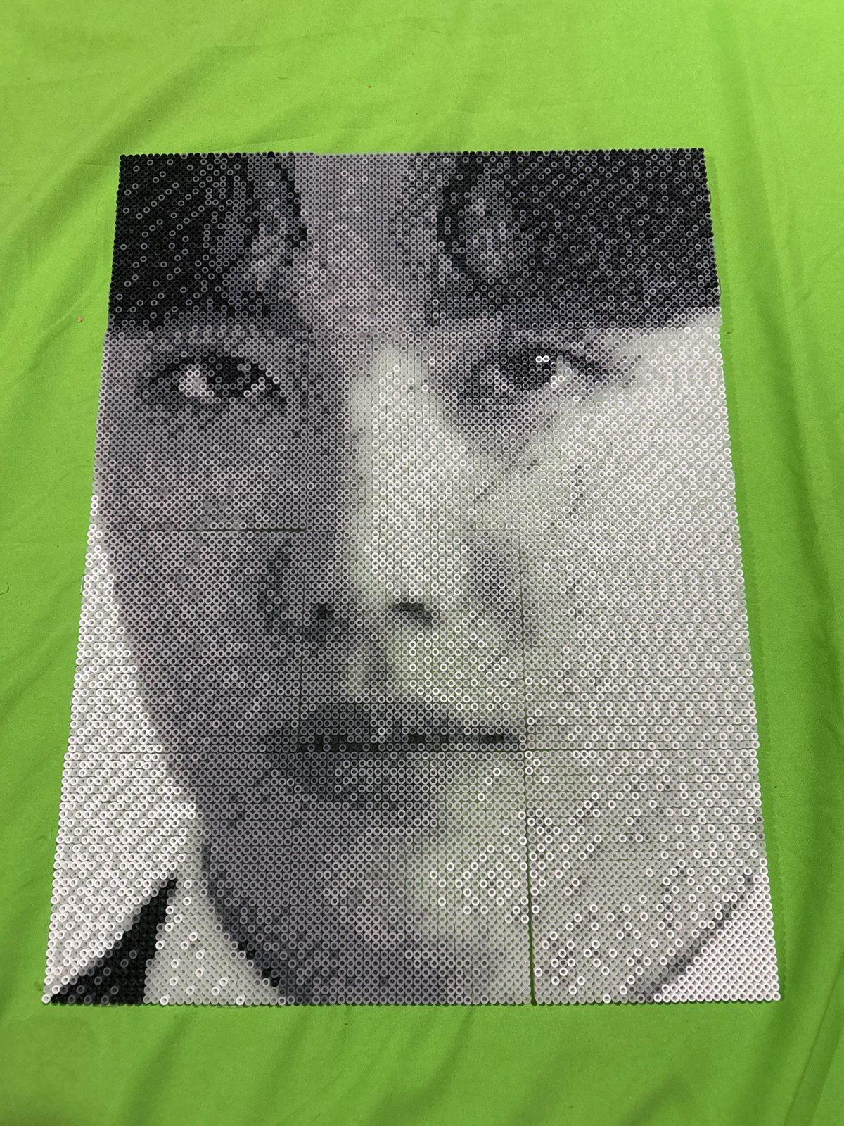 Beaded portrait artwork documented in Puebla, Mexico