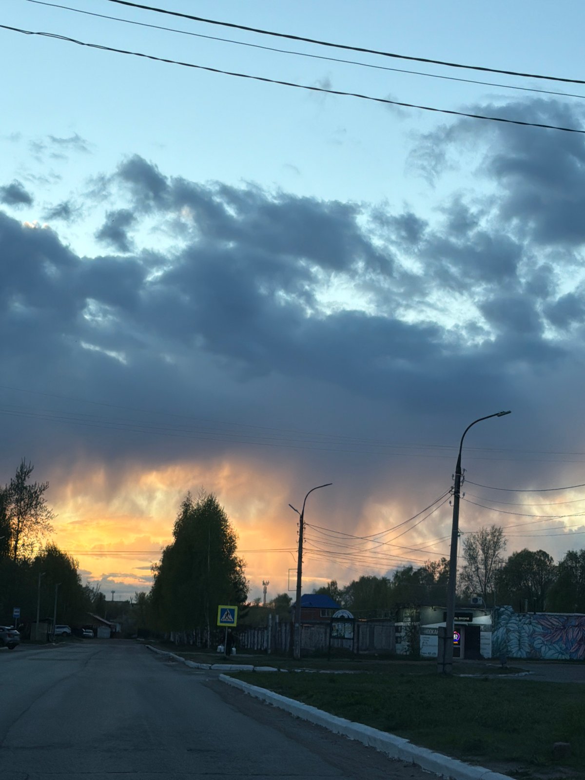 Dramatic storm clouds and sunset observed over Chaikovsky, Russia